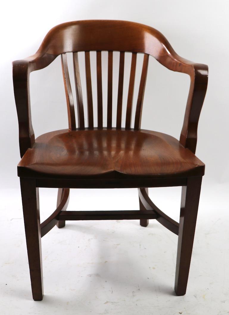 Great pair of Bank of England, Yale Library style office chairs originally from the NYS assembly, both marked “Assembly”.
Extra grade construction, very good clean and ready to use condition.
Measures: Total H 33 x arm H 28 x seat H 19.5