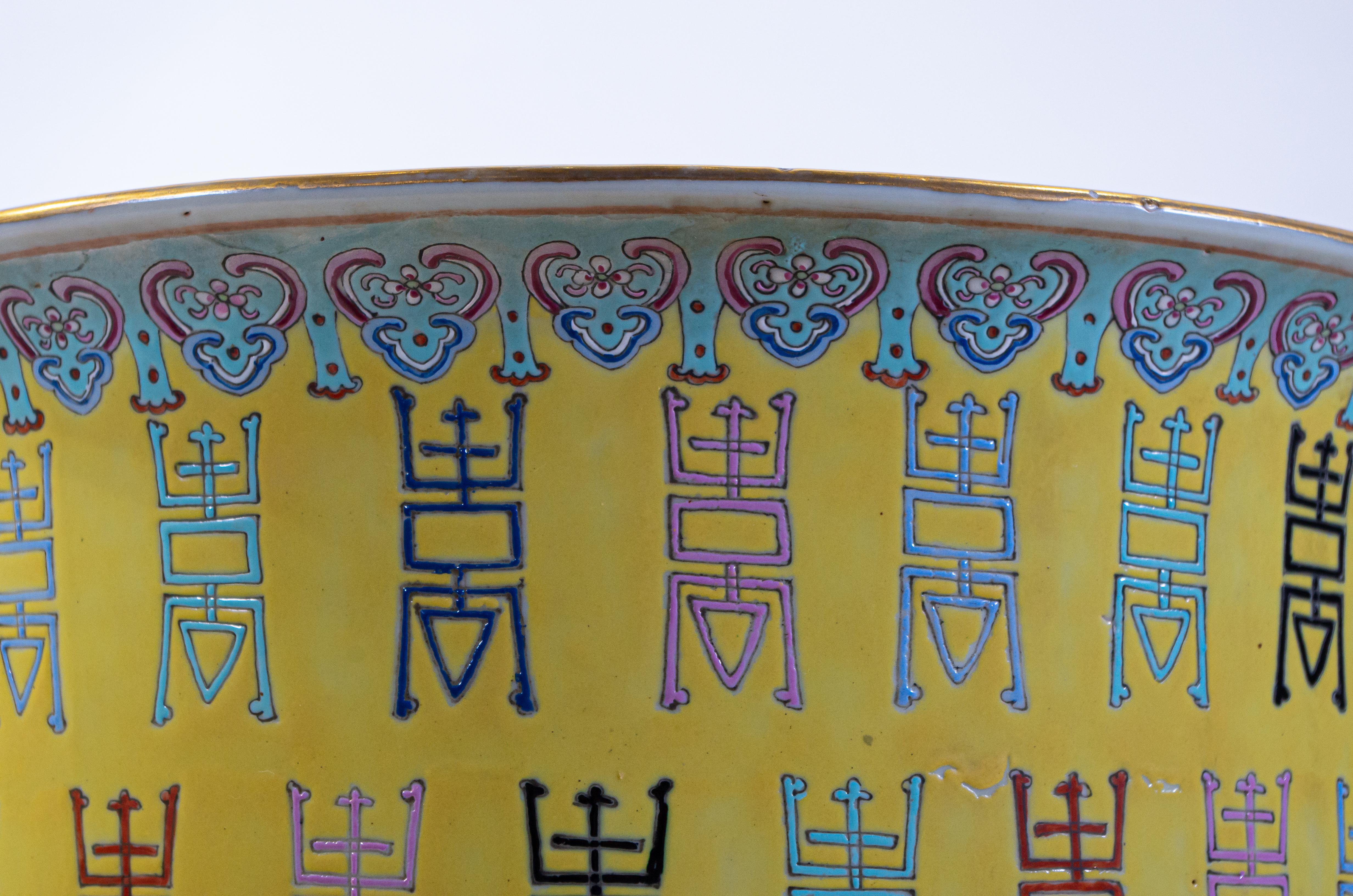 Pair of Yellow Ground Chinese Famille Rose Planters with Ch. Characters In Good Condition For Sale In New York, NY