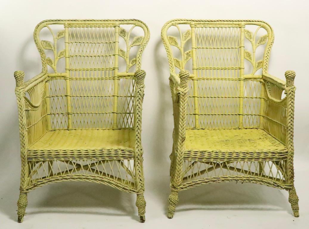 Pair of Ornate Wicker Lounge Chairs Attributed to Heywood Brothers 9