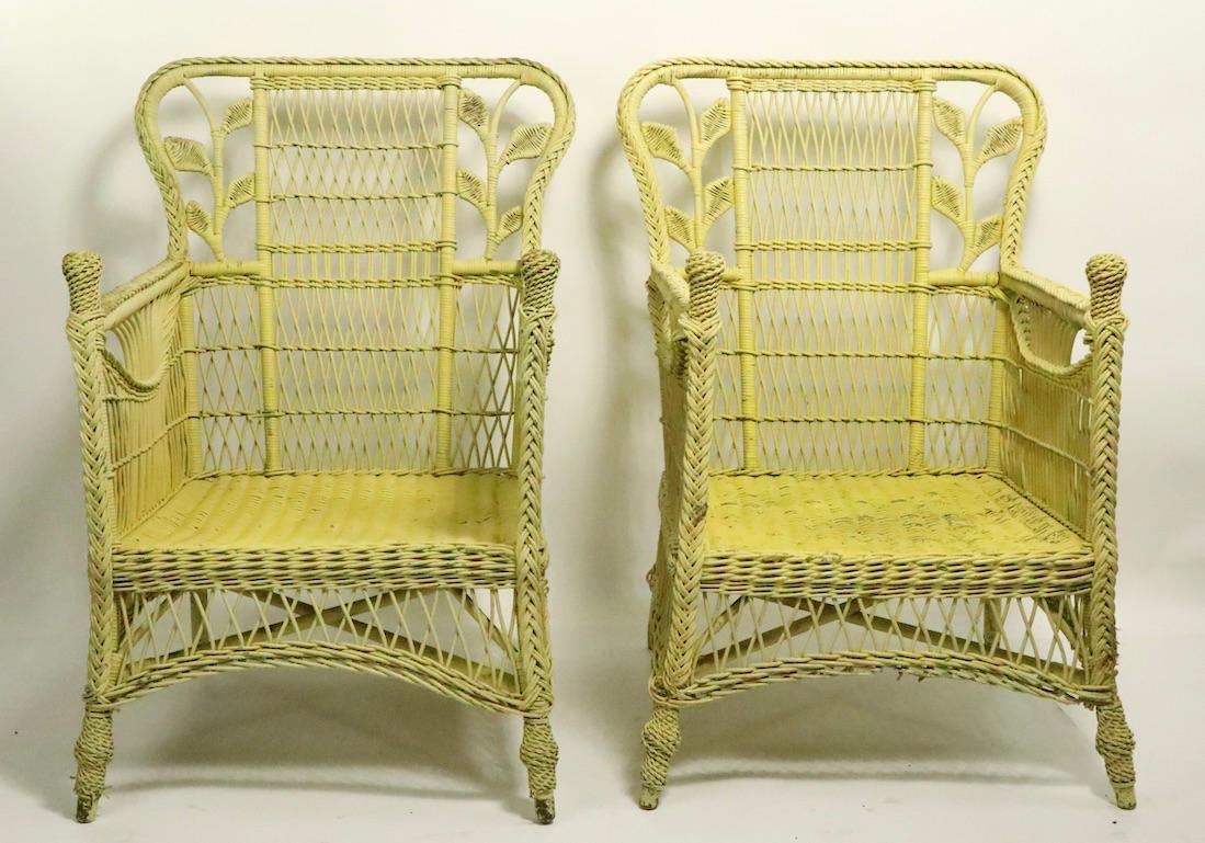 Pair of Ornate Wicker Lounge Chairs Attributed to Heywood Brothers 10