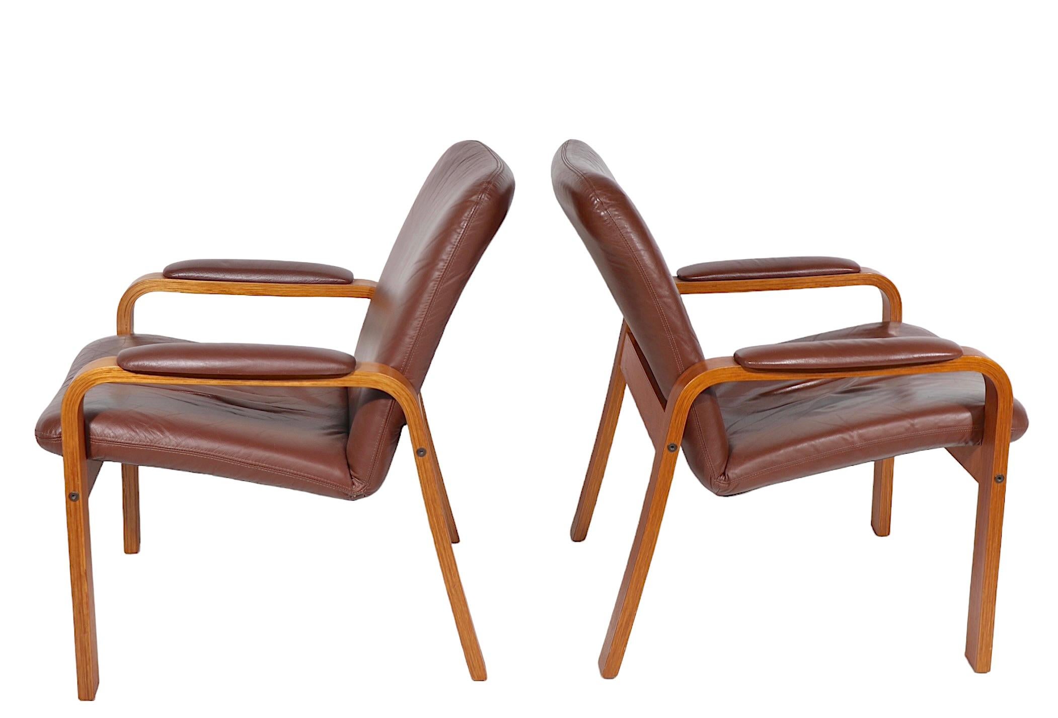 Leather Pr. Scandinavian Mid Century Modern Lounge Arm Chairs Made in Norway by Ekorness For Sale