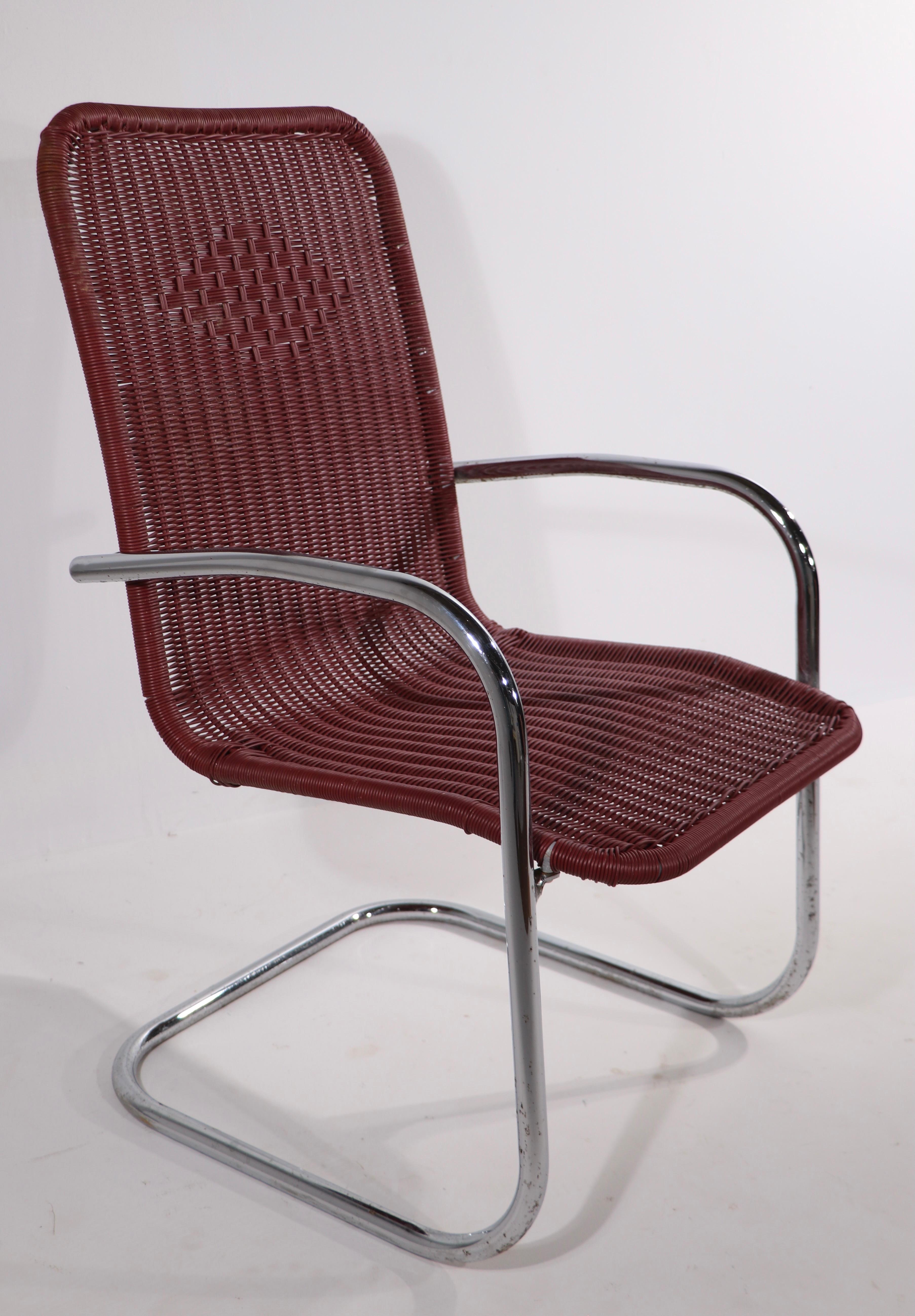 Mid-Century Modern Pr. Tubular Chrome and Woven Plastic Cantilevered Lounge Chairs For Sale