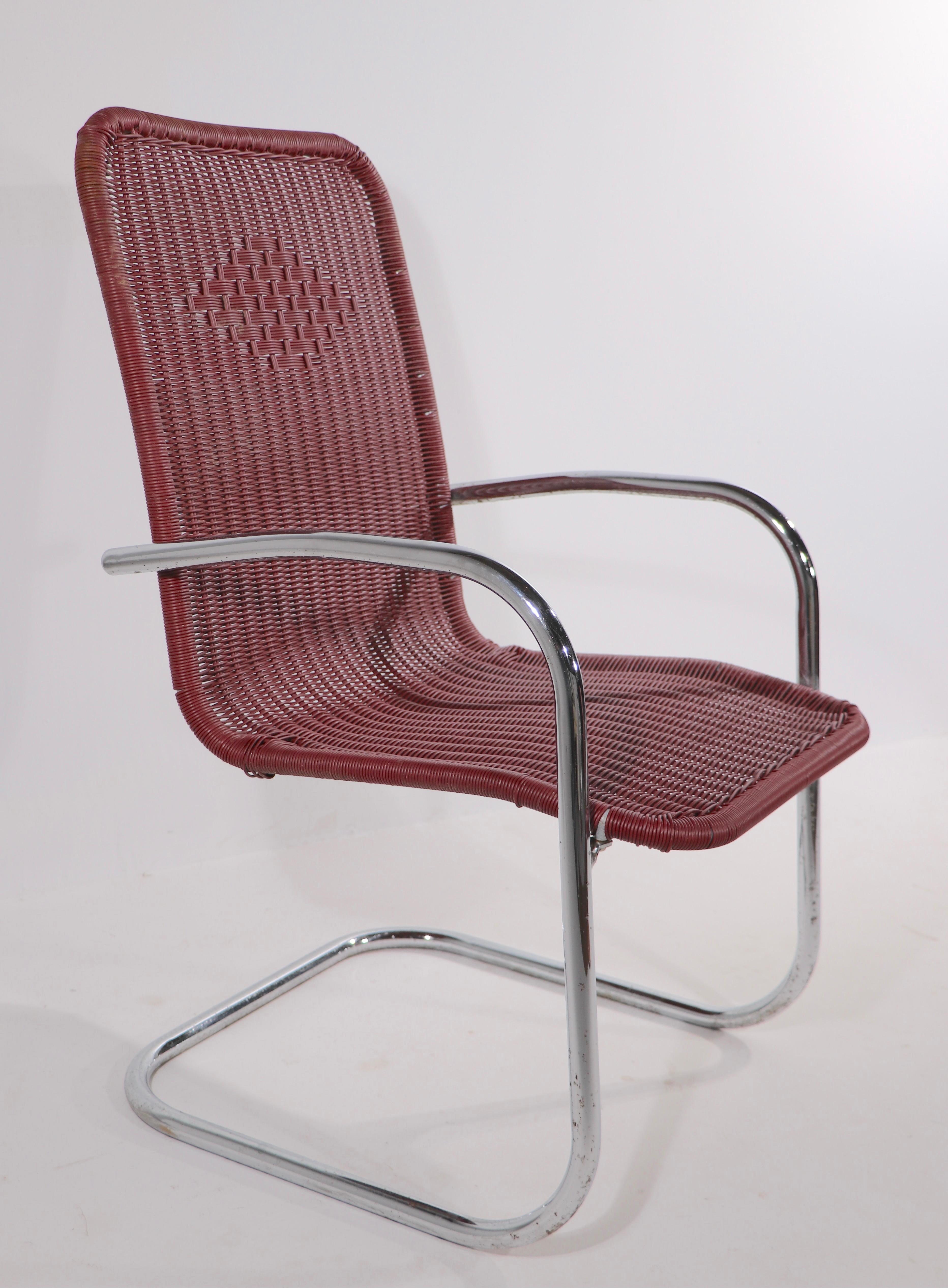 American Pr. Tubular Chrome and Woven Plastic Cantilevered Lounge Chairs For Sale