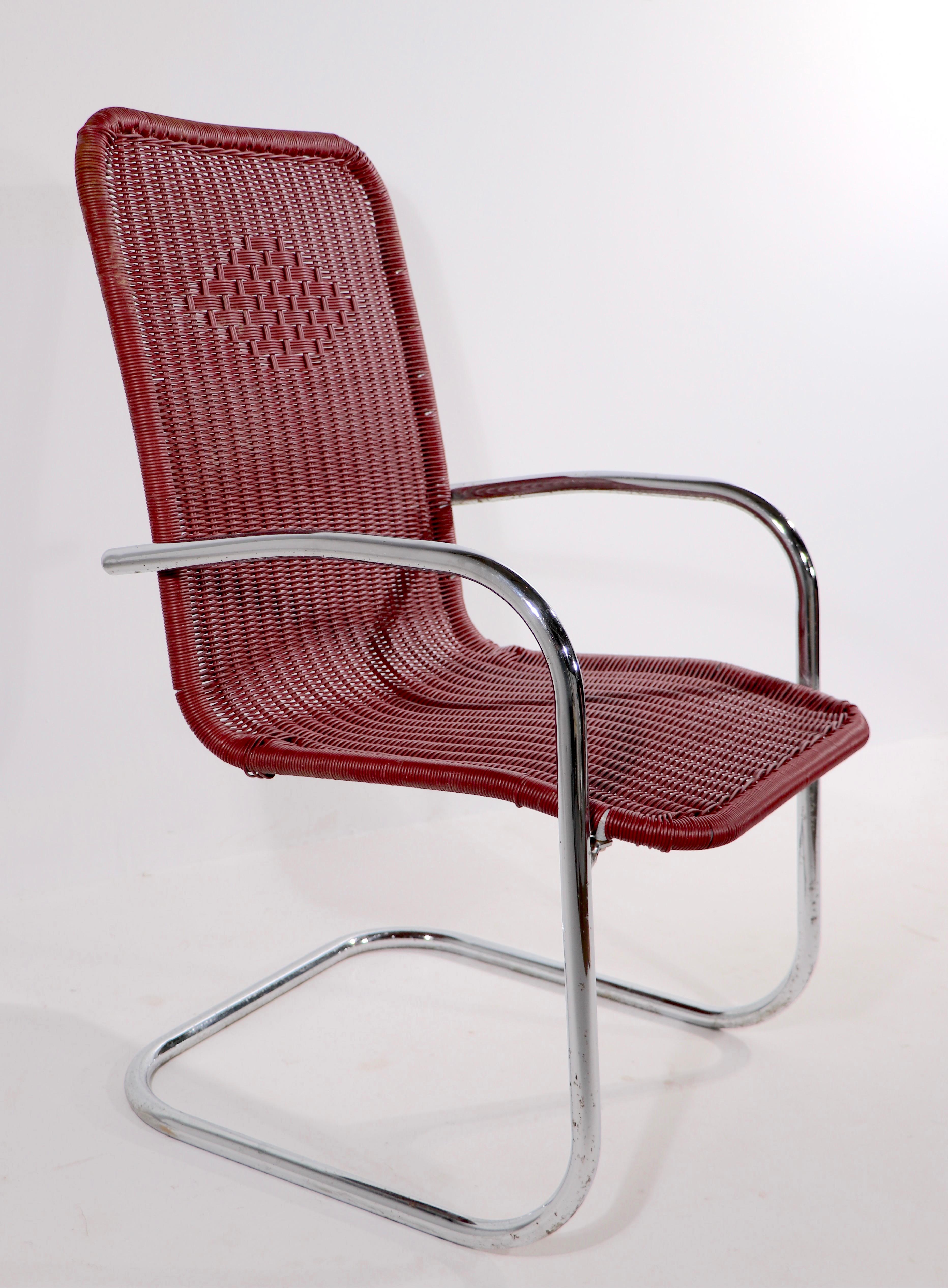 Pr. Tubular Chrome and Woven Plastic Cantilevered Lounge Chairs In Good Condition For Sale In New York, NY
