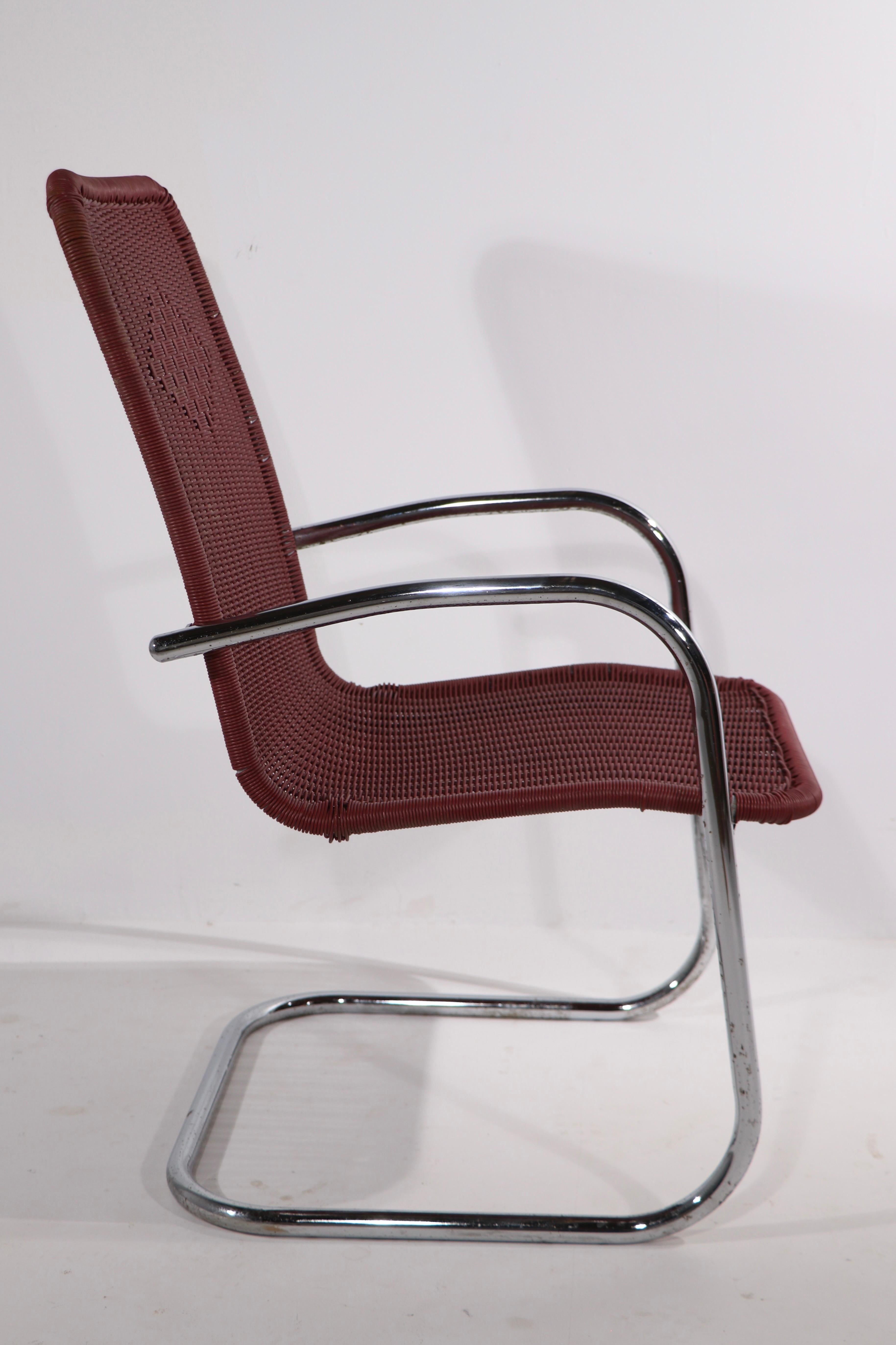 20th Century Pr. Tubular Chrome and Woven Plastic Cantilevered Lounge Chairs For Sale