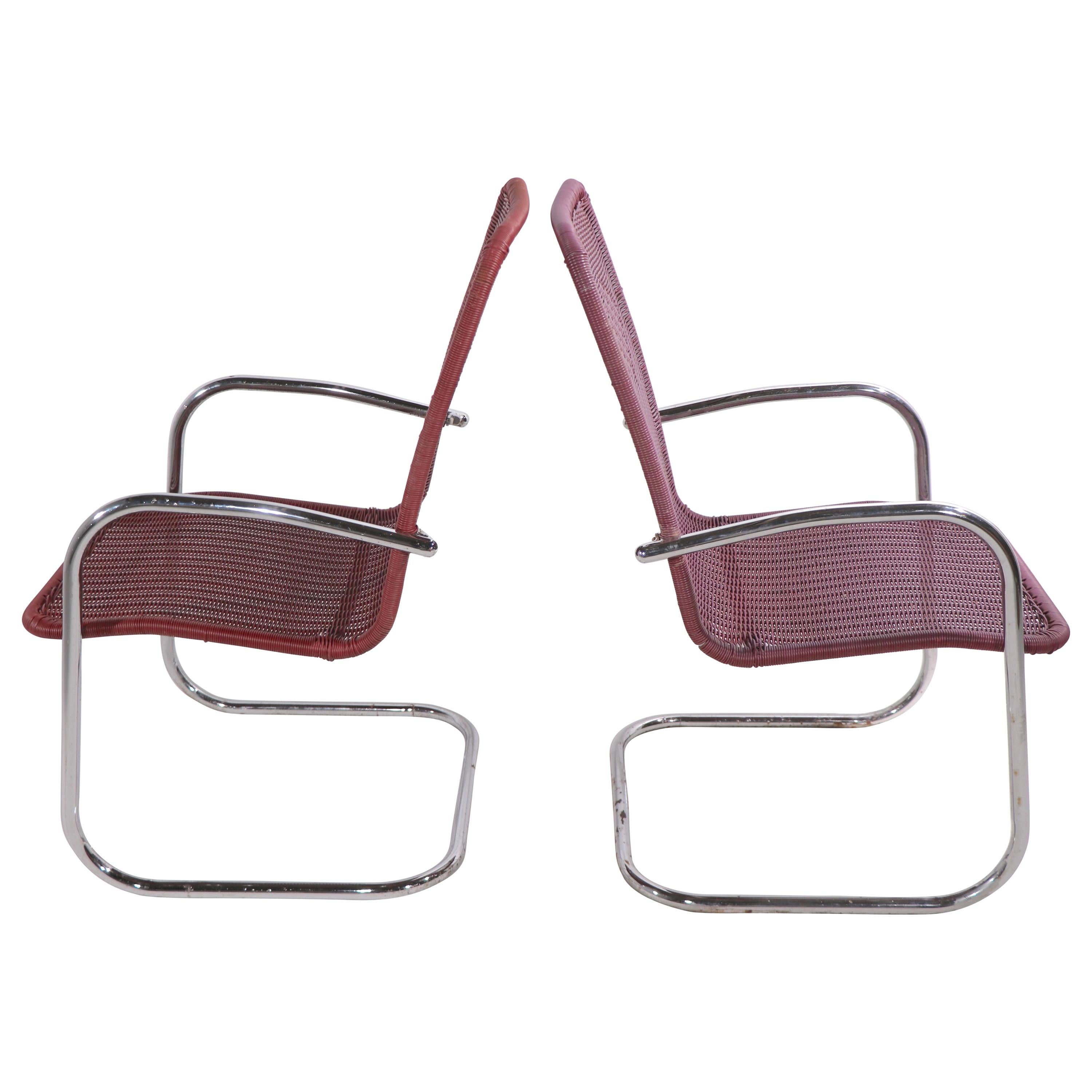 Pr. Tubular Chrome and Woven Plastic Cantilevered Lounge Chairs