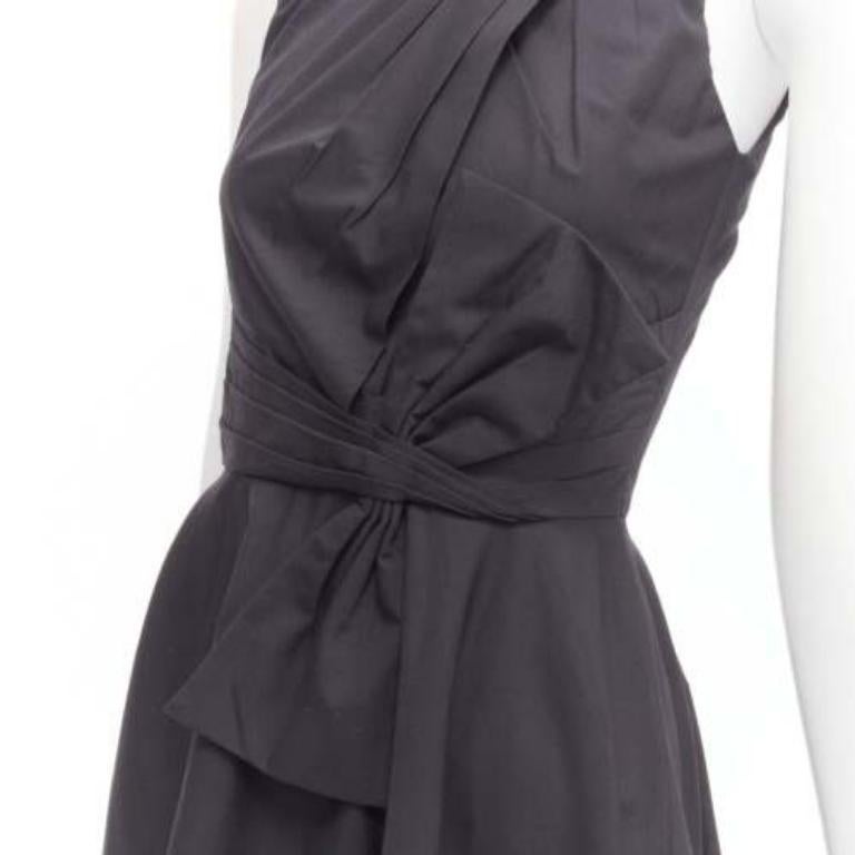 PRABAL GURUNG black cotton bow detail high waist fit flared dress US0 XS
Reference: SNKO/A00420
Brand: Prabal Gurung
Material: Cotton
Color: Black
Pattern: Solid
Closure: Zip
Lining: Black Silk
Made in: United States

CONDITION:
Condition: