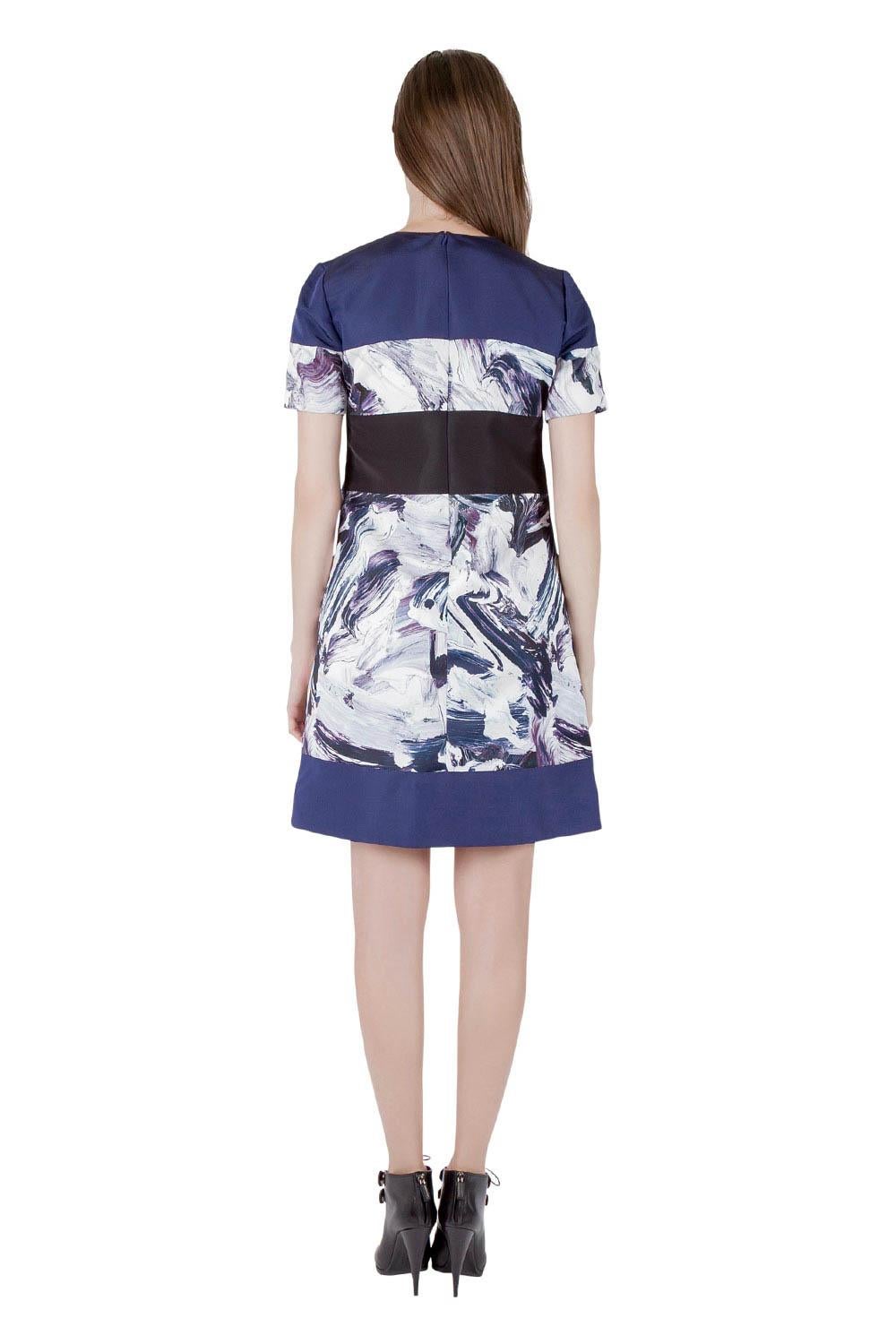 The shift dress is by Prabal Gurung and is tailored from a fine fabric blend. The multicolor piece features a brush stroke print with contrasting trim on the waistline. Black booties will perfectly complement this beautiful creation.

Includes: The