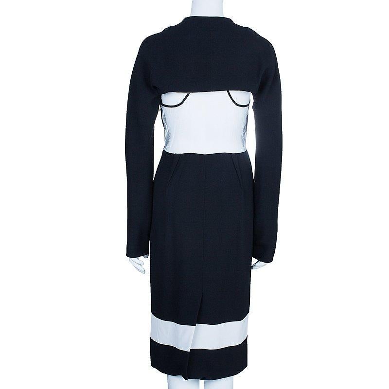 Take the spotlight in this simple but attractive racer dress from the stunning collections of Prabal Gurung. It has been crafted in polyester and silk and looks simply versatile in monochrome design. The contrasting waist patch at the back lends it