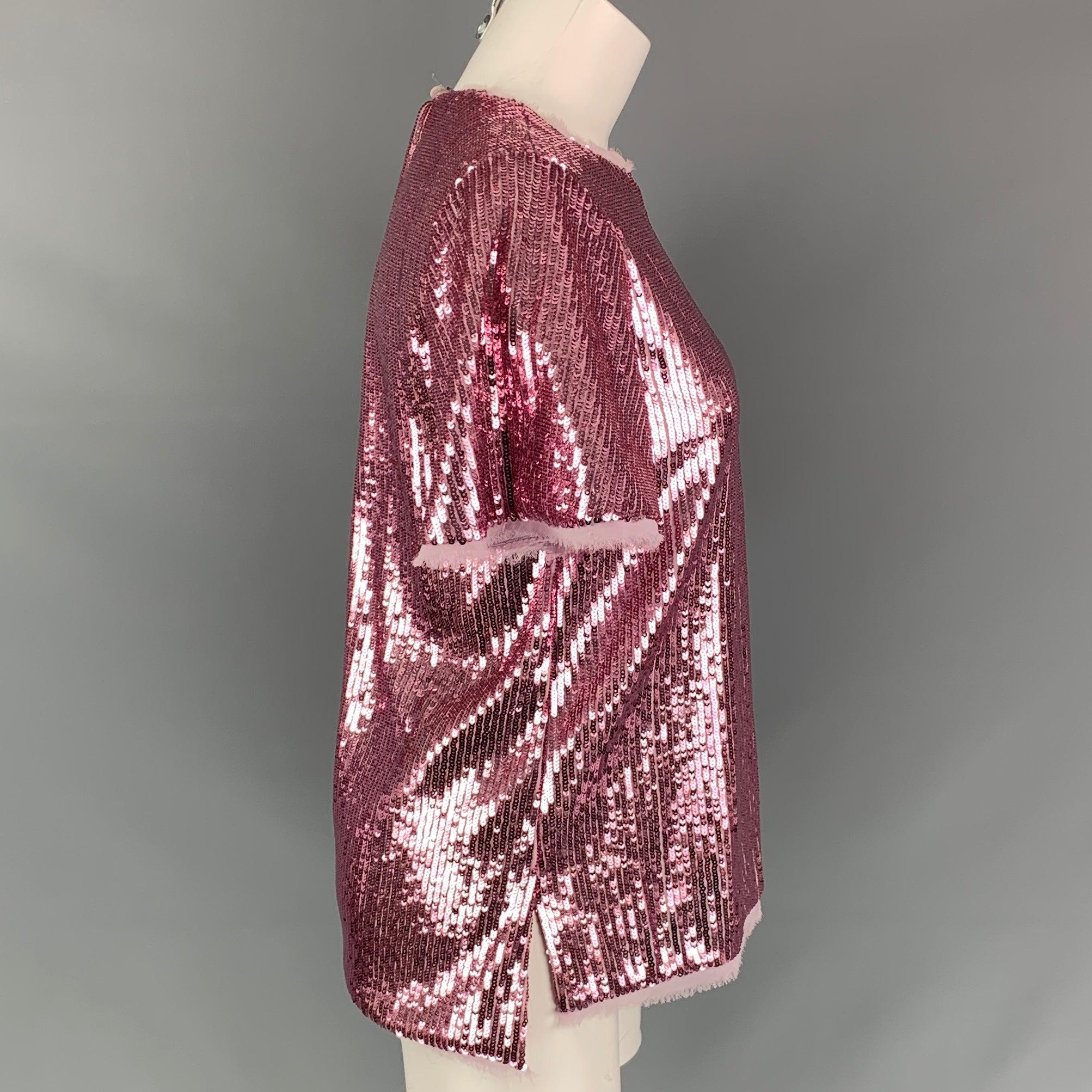 PRABAL GURUNG dress top in a pink sequined polyester featuring a raw hem, side slits, and a single back button closure. Made in USA.
Excellent
Pre-Owned Condition. 

Marked:   0 

Measurements: 
 
Shoulder: 14.5 inches  Bust: 34 inches  Sleeve: 10