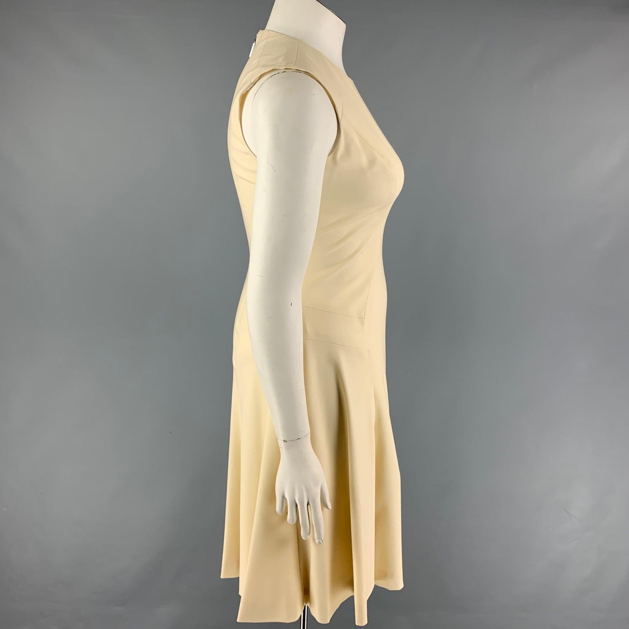 PRABAL GURUNG dress comes in a cream wool with a silk lining featuring an a-line style, sleeveless, and a back zip up closure. Made in USA.
New With Tags.
 

Marked:   10 

Measurements: 
 
Shoulder: 14.5 inches  Bust:
34 inches  Waist: 29 inches 