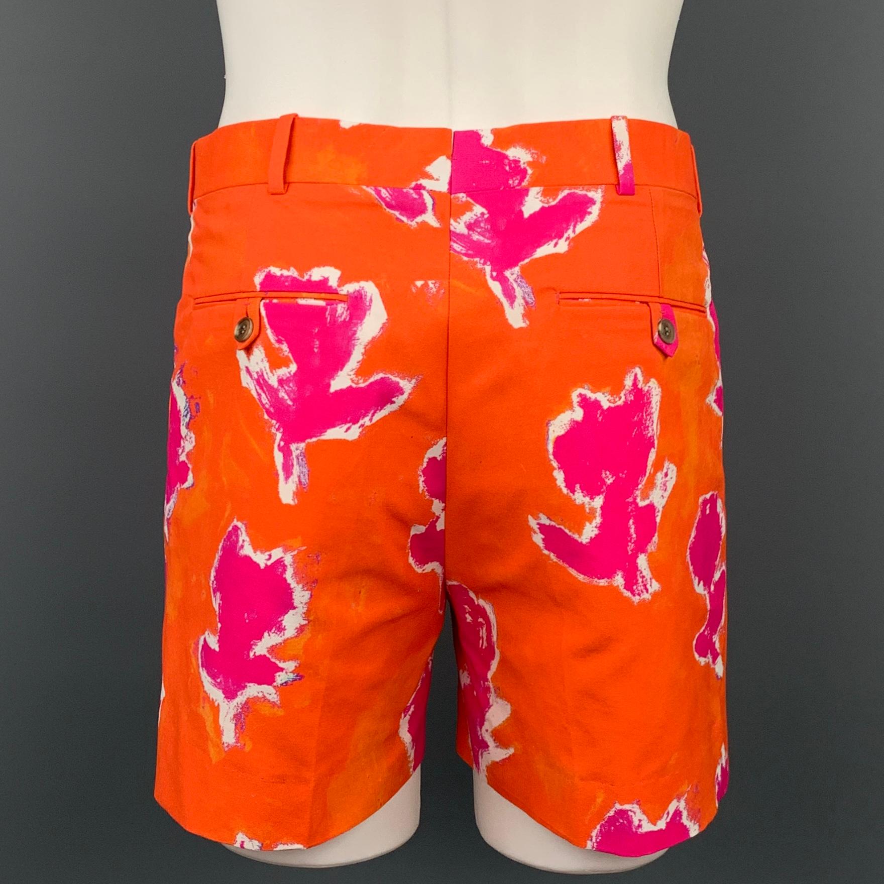 PRABAL GURUNG shorts comes in a orange & fuchsia cotton / polyamide featuring front pleats, slit pockets, front tab, and a zip fly closure. 

New With Tags. 
Marked: 32
Original Retail Price: $695.00

Measurements:

Waist: 33 in.
Rise: 11