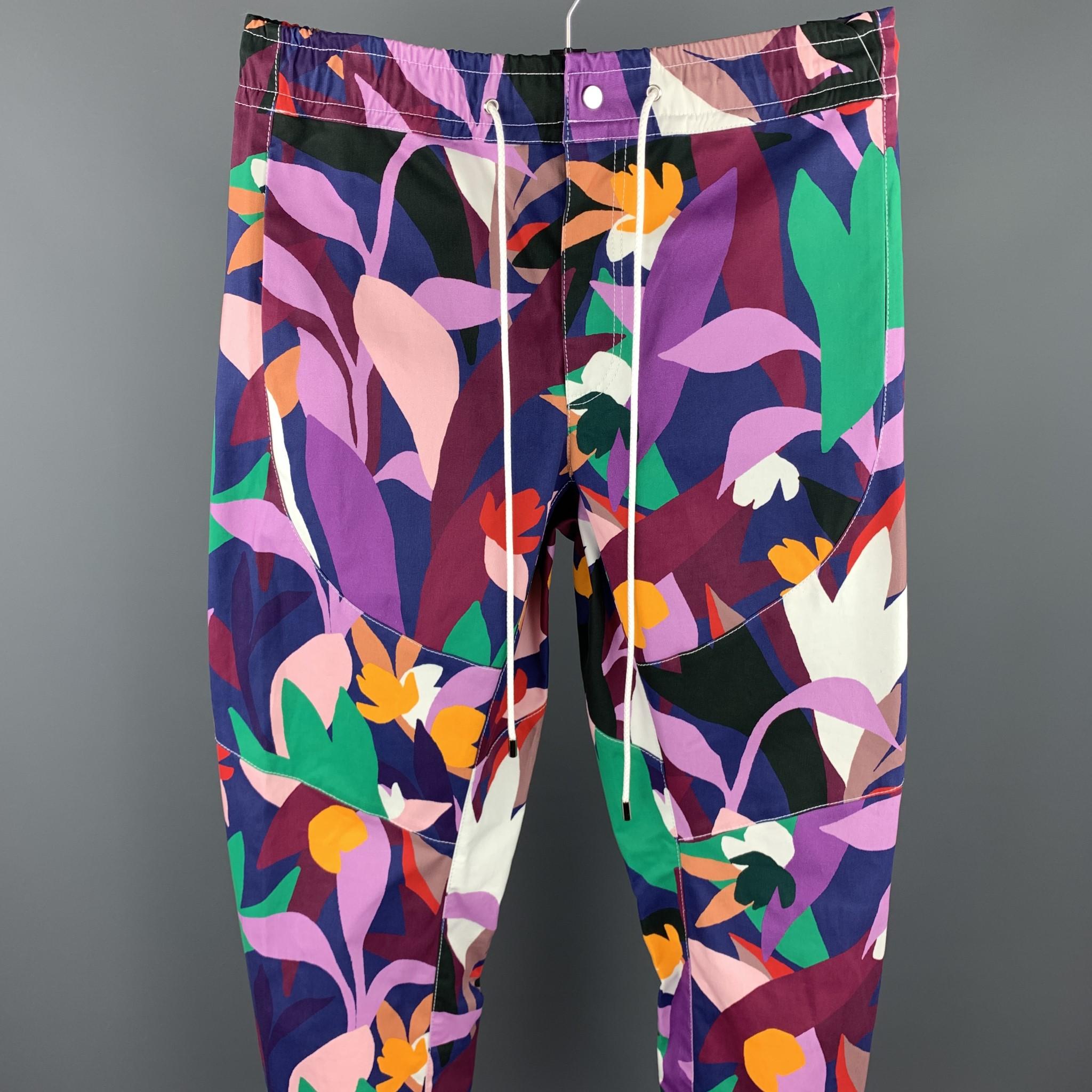 PRABAL GURUNG casual pants comes in a multi-color print cotton featuring a elastic waistband, drawstring, and a zip fly closure. Made in USA.

New With Tags. 
Marked: US 34

Measurements:

Waist: 34 in. 
Rise: 10 in. 
Inseam: 29 in. 
