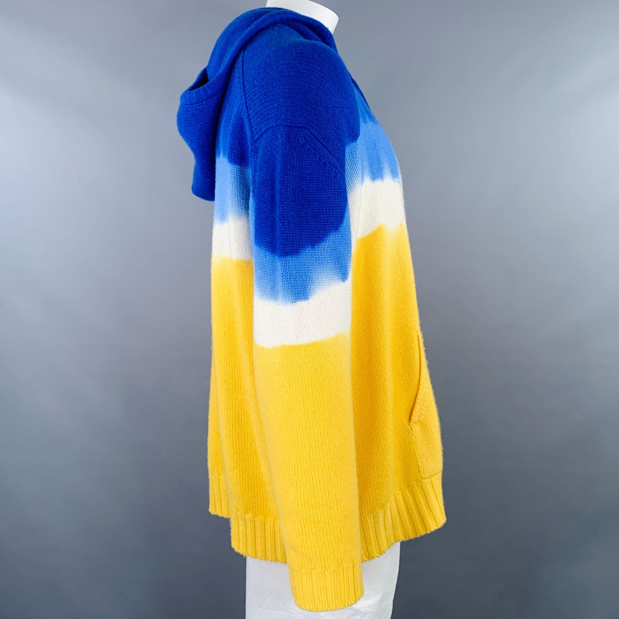 PRABAL GURUNG sweater
in a yellow and blue cashmere featuring a hooded style, vibrant stripe pattern, and kangaroo pocket. Very Good Pre-Owned Condition. Moderate pilling. 

Marked:   XL 

Measurements: 
 
Shoulder: 26 inches Chest: 58 inches