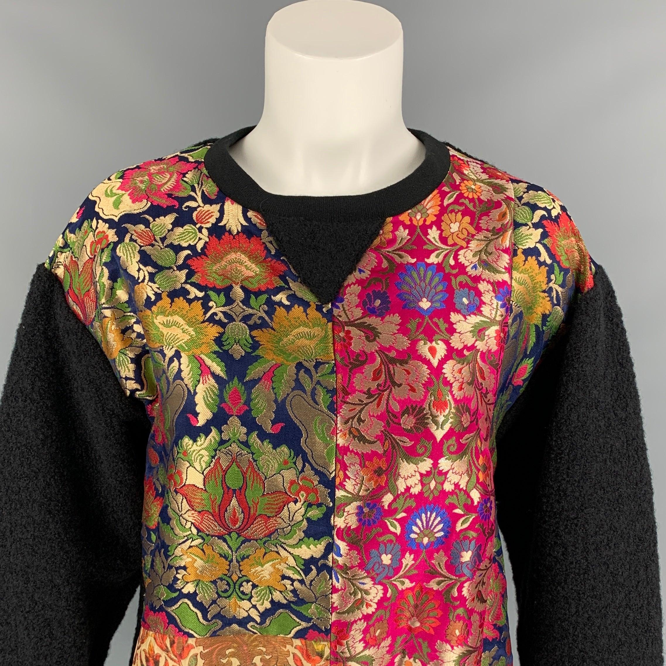 PRABAL GURUNG pullover comes in a black & multi-color wool / cotton featuring a patchwork design, ribbed hem, and a crew-neck. Made in USA.
New With Tags. 

Marked:   XS 

Measurements: 
 
Shoulder: 19 inches  Bust: 38 inches  Sleeve: 26.5 inches 