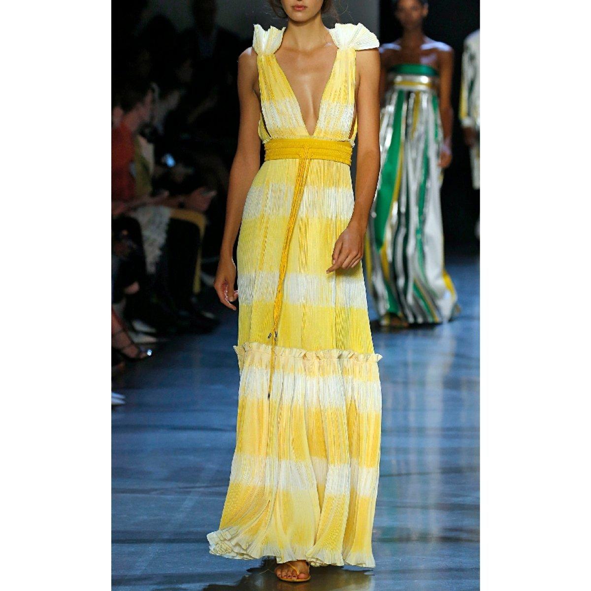 Prabal Gurung's 'Tadia' plissé gown brings a little sunshine to your closet. 
Featuring a tie-dye print and ruffled shoulder attachments, the maxi-dress plunges into a deep 
V-neckline at the front and back. 
The relaxed silhouette creates