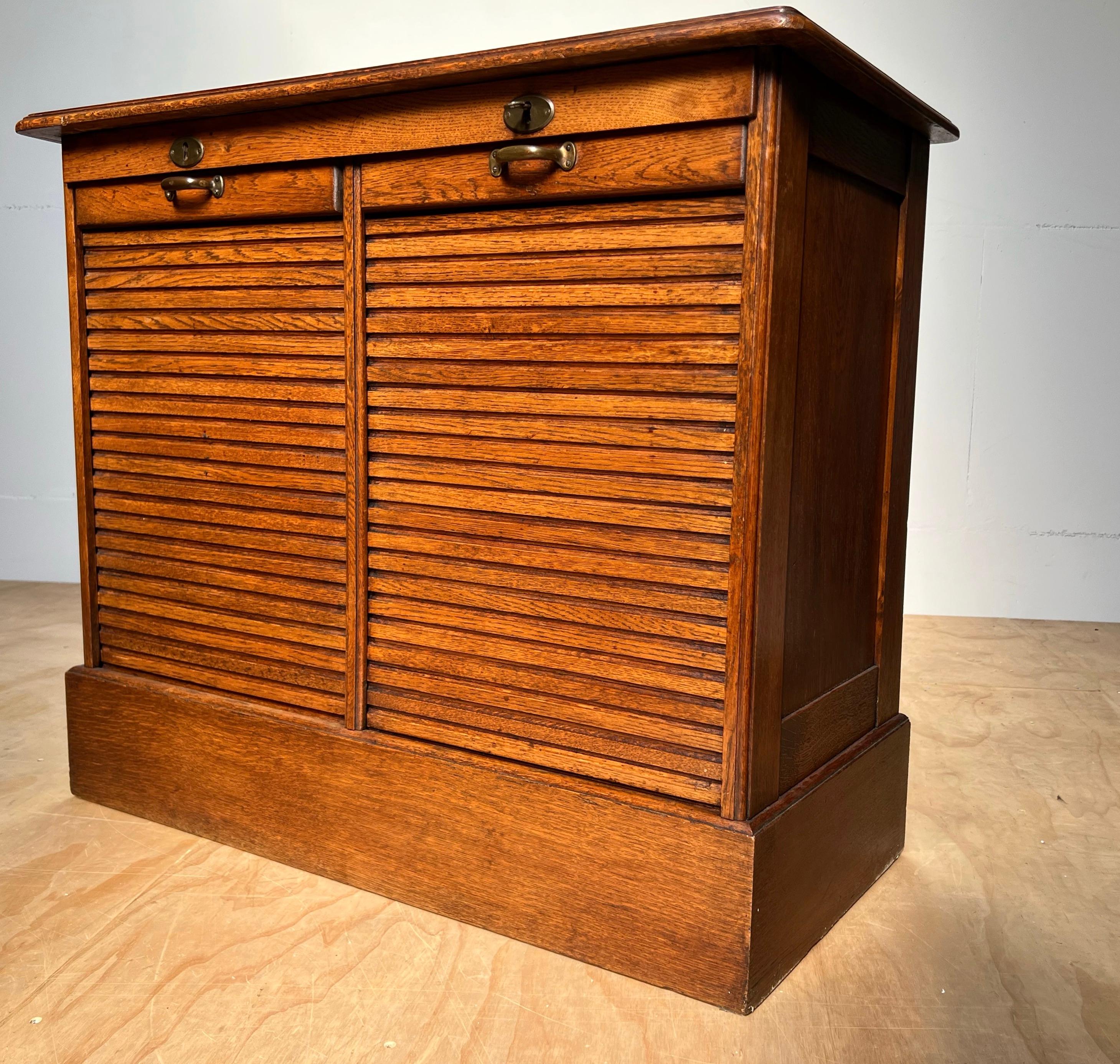 Museum quality and condition, Arts & Crafts era, solid oak filing cabinet.

This Dutch filing cabinet is another fine example of the quality furniture that was made in the earliest years of 20th century Europe. The stylish design combined with the