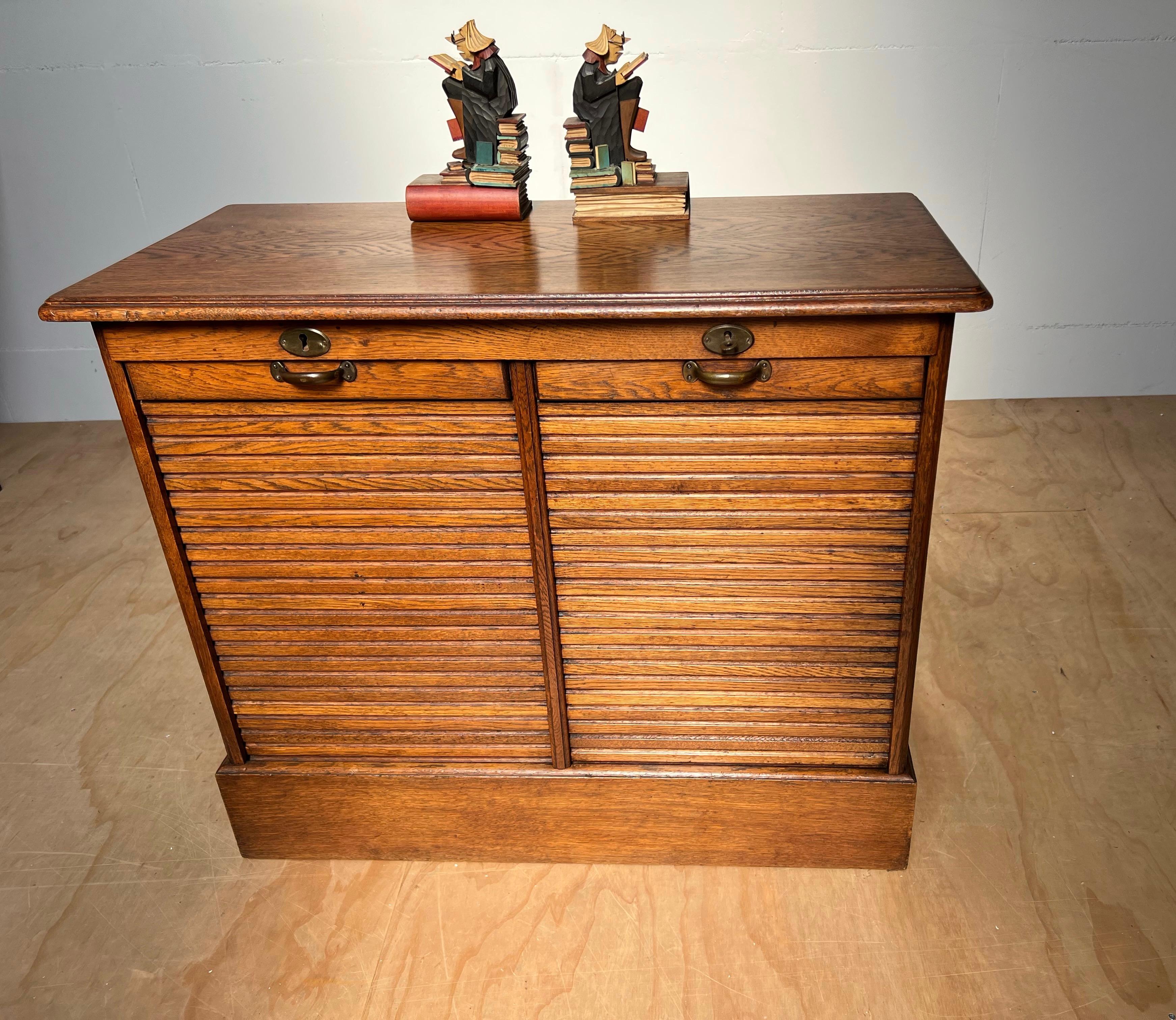 Hand-Carved Practical Dutch Arts & Crafts Filing Cabinet with Double Roller Door and Drawers