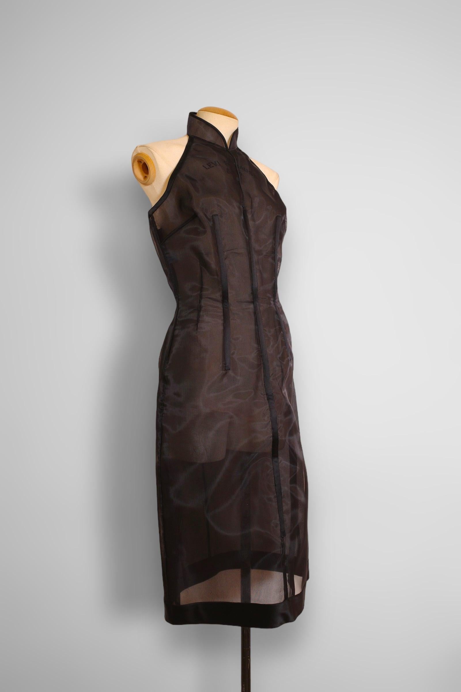 Vintage Prada 1995 runway collection sheer halter dress. The dress is made of nylon and completely boned all around. 

Size 44, (L)

Condition: 8/10, very good preloved condition, back bones are slightly poking through but minimal. Bones are a bend