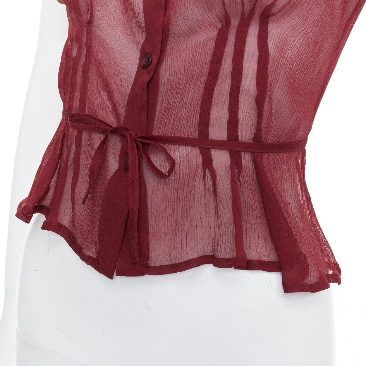 PRADA 1997 Vintage Runway burgundy silk sheer tie belt blouse top IT40 S
Reference: TGAS/E00332
Brand: Prada
Designer: Miuccia Prada
Collection: 1997 SS - Runway
Material: Silk
Color: Burgundy
Pattern: Solid
Closure: Button
Extra Details: Silk tie