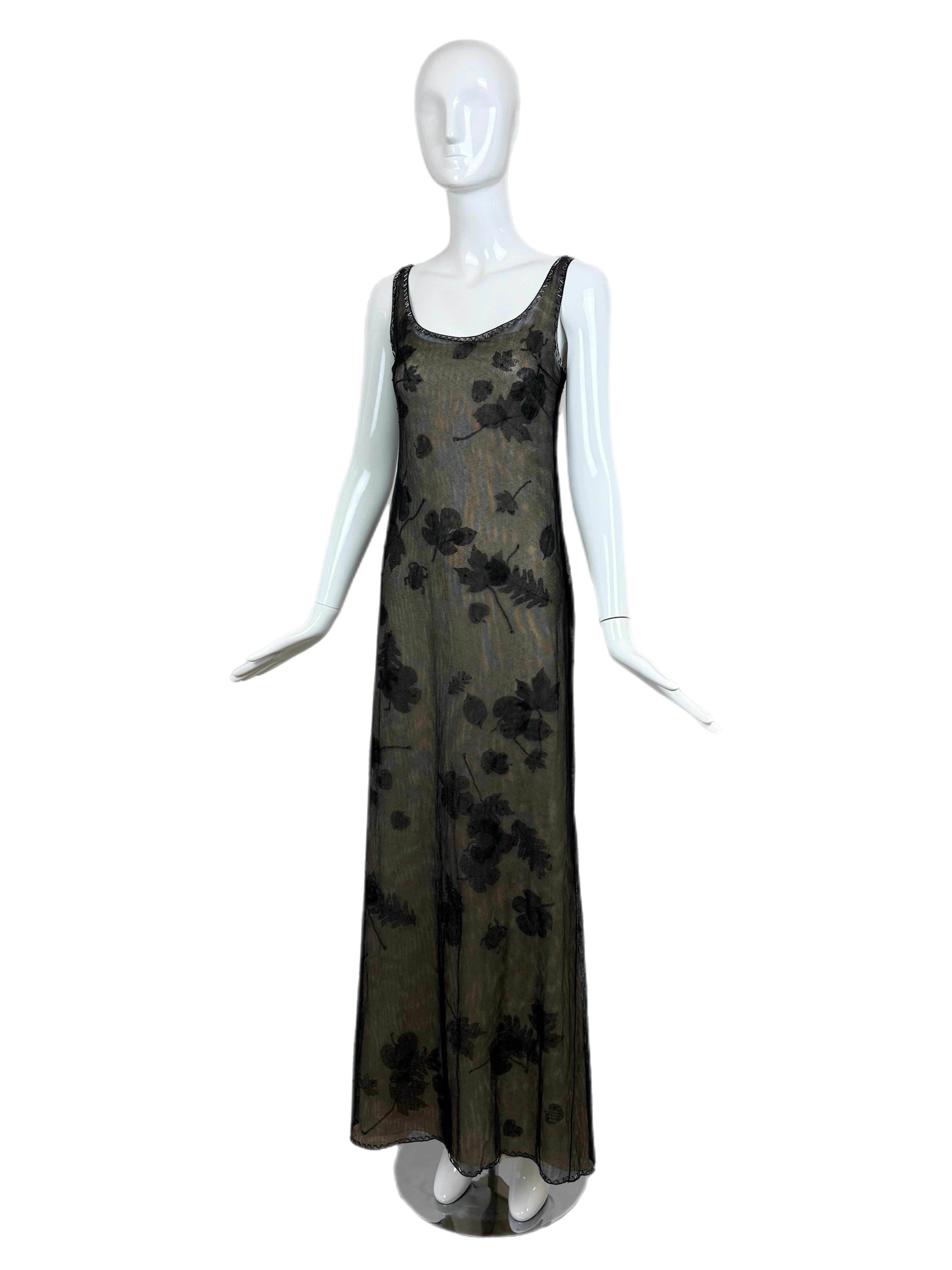 Prada
FW99
Runway Print
Black mesh gown with attached (can unattach) nude silk slip
Beads at neckline and hemline
Also black beads on the flowers
Slip is side zip and overlay is snap closure
Size IT38
Excellent condition, only flaw is some beading