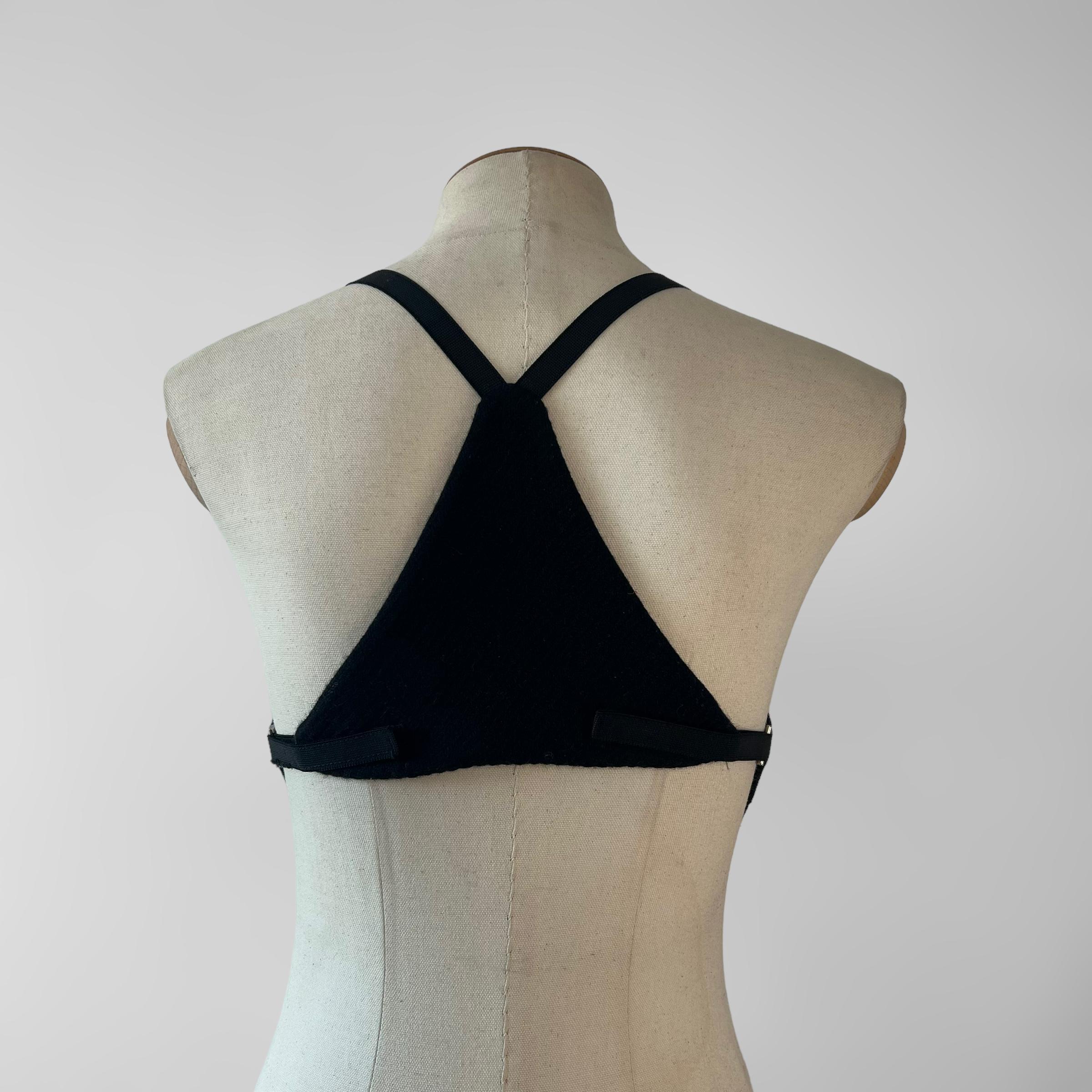 Miuccia Prada black wool tweed corset top with matching pants. The set is from the 1999fw collection, which is one of the most collected Prada collections. 

Corset:
Size: 40
Condition 8/10 with internal staining, top straps altered but restorable,