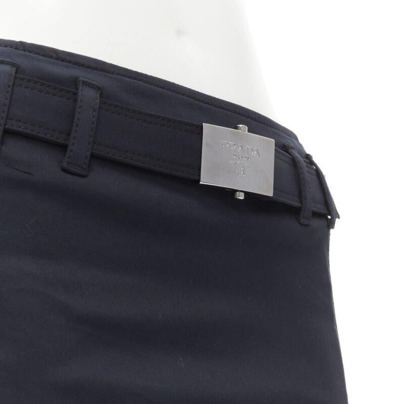 PRADA 2006 navy cotton silver logo belt knee length pencil skirt IT36 XS
Reference: KNCN/A00017
Brand: Prada
Designer: Miuccia Prada
Collection: 2006
Material: Cotton
Color: Navy, Silver
Pattern: Solid
Closure: Zip
Extra Details: Zip back closure.