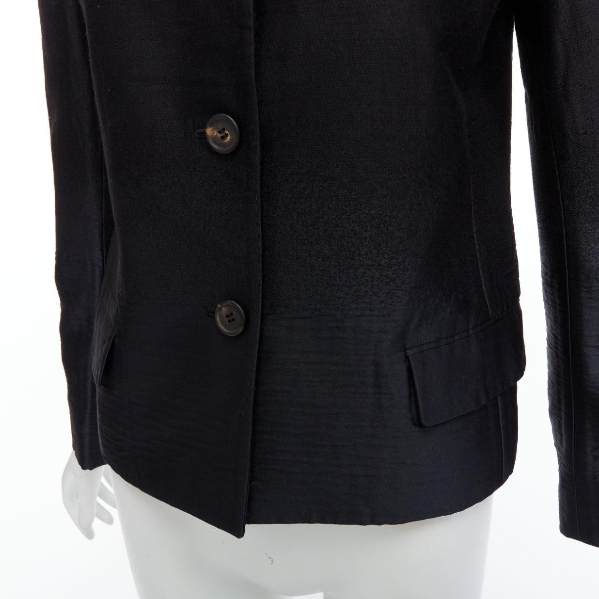 PRADA 2007 Vintage black wool degrade fabric blazer jacket IT38 XS
Reference: PYCN/A00126
Brand: Prada
Designer: Miuccia Prada
Collection: 2007 - Runway
Material: Wool, Blend
Color: Black
Pattern: Solid
Closure: Button
Lining: Black Fabric
Extra
