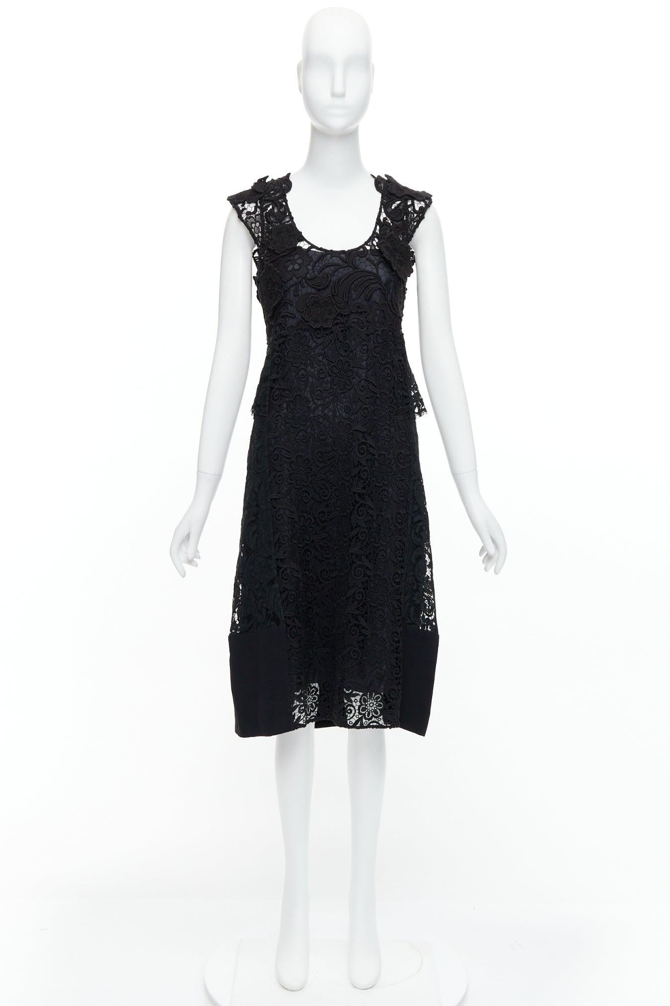 PRADA 2008 black cotton blend heavy lace applique panelled dress IT38 XS
Reference: PYCN/A00133
Brand: Prada
Designer: Miuccia Prada
Collection: Spring 2009 - Runway
Material: Cotton, Blend
Color: Black
Pattern: Solid
Closure: Slip On
Lining: Black