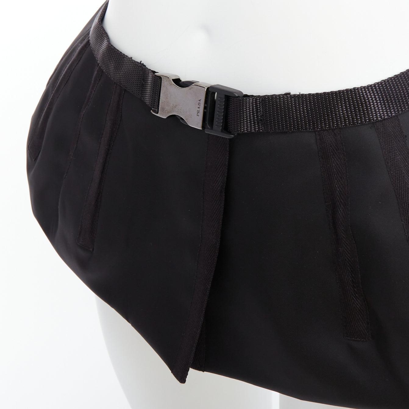 PRADA 2008 black nylon silver logo buckle fabric peplum belt IT38 XS
Reference: PYCN/A00139
Brand: Prada
Designer: Miuccia Prada
Collection: 2008
Material: Nylon, Fabric
Color: Black
Pattern: Solid
Closure: Buckle
Lining: Black Fabric
Extra Details: