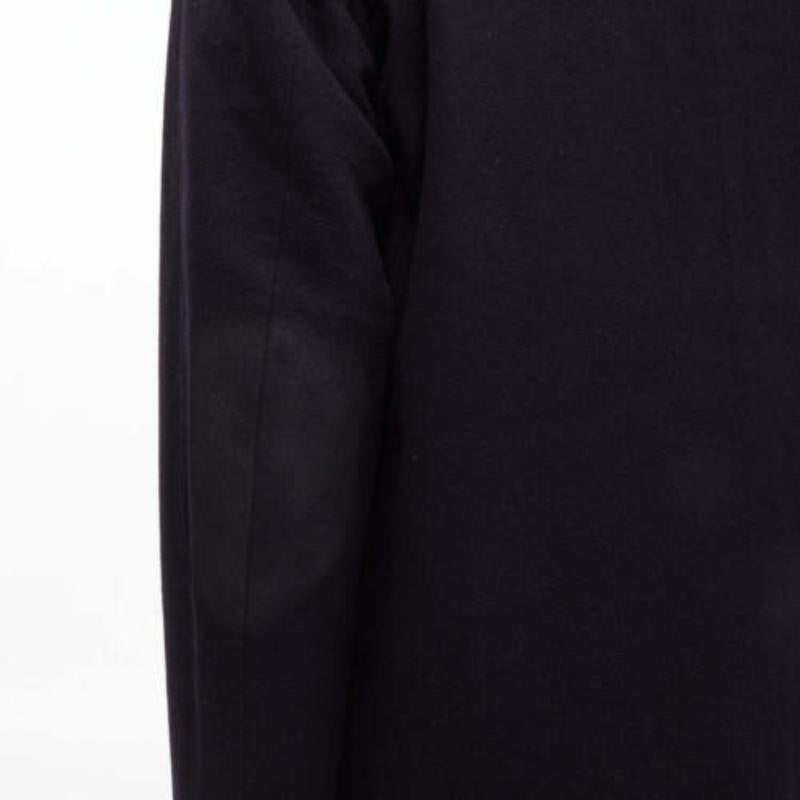 PRADA 2009 100% virgin wool black minimalist coated sleeve coat IT48 M
Reference: YNWG/A00184
Brand: Prada
Designer: Miuccia Prada
Collection: 2009
Material: Virgin Wool
Color: Black
Pattern: Solid
Closure: Zip
Lining: Black Fabric
Extra Details: