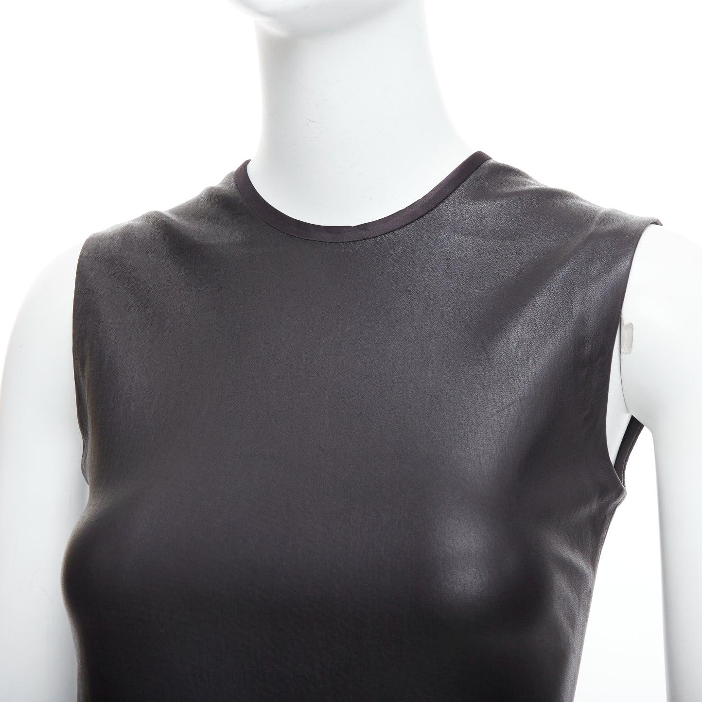 PRADA 2009 black leather crew neck fitted dress IT38 XS
Reference: MECG/A00043
Brand: Prada
Designer: Miuccia Prada
Collection: 2009
Material: Leather
Color: Black
Pattern: Solid
Closure: Zip
Lining: Black Fabric
Extra Details: Back zip.
Made in: