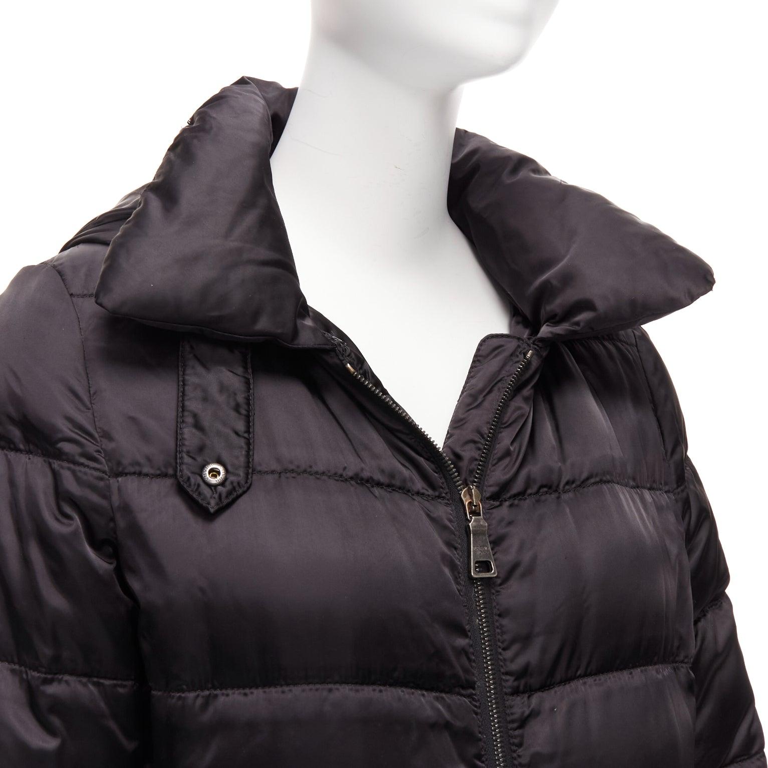 PRADA 2010 black shiny nylon hooded quilted long sleeve puffer coat IT42 M
Reference: CNPG/A00070
Brand: Prada
Designer: Miuccia Prada
Collection: 2010
Material: Nylon
Color: Black
Pattern: Solid
Closure: Zip
Lining: Black Fabric
Made in: