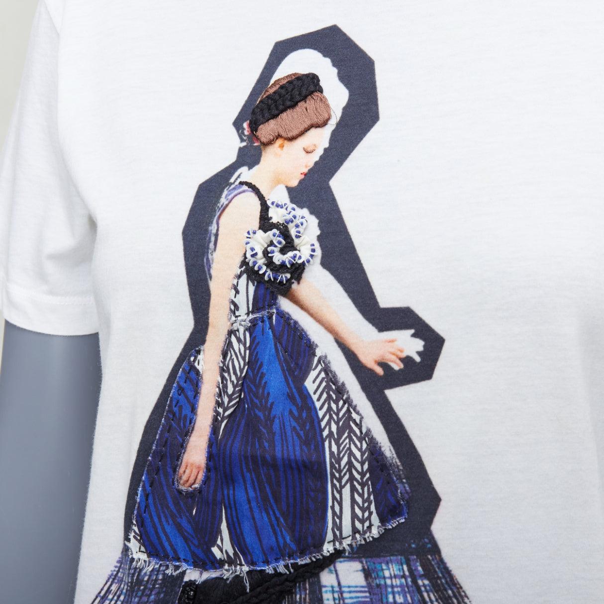 PRADA 2010 blue black runway model applique cream cotton tshirt S
Reference: MECG/A00061
Brand: Prada
Designer: Miuccia Prada
Collection: FW 2010
Material: Cotton
Color: Cream, Blue
Pattern: Photographic Print
Closure: Slip On

CONDITION:
Condition: