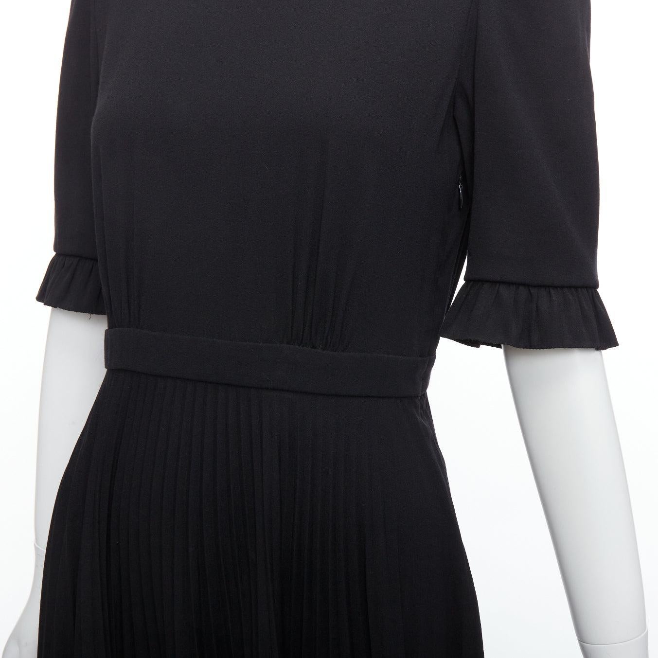 PRADA 2016 black ruffle cuff hem A-line pleated crew neck midi dress IT40 S
Reference: PYCN/A00130
Brand: Prada
Designer: Miuccia Prada
Collection: 2016
Material: Polyester, Blend
Color: Black
Pattern: Solid
Closure: Keyhole Button
Lining: Black