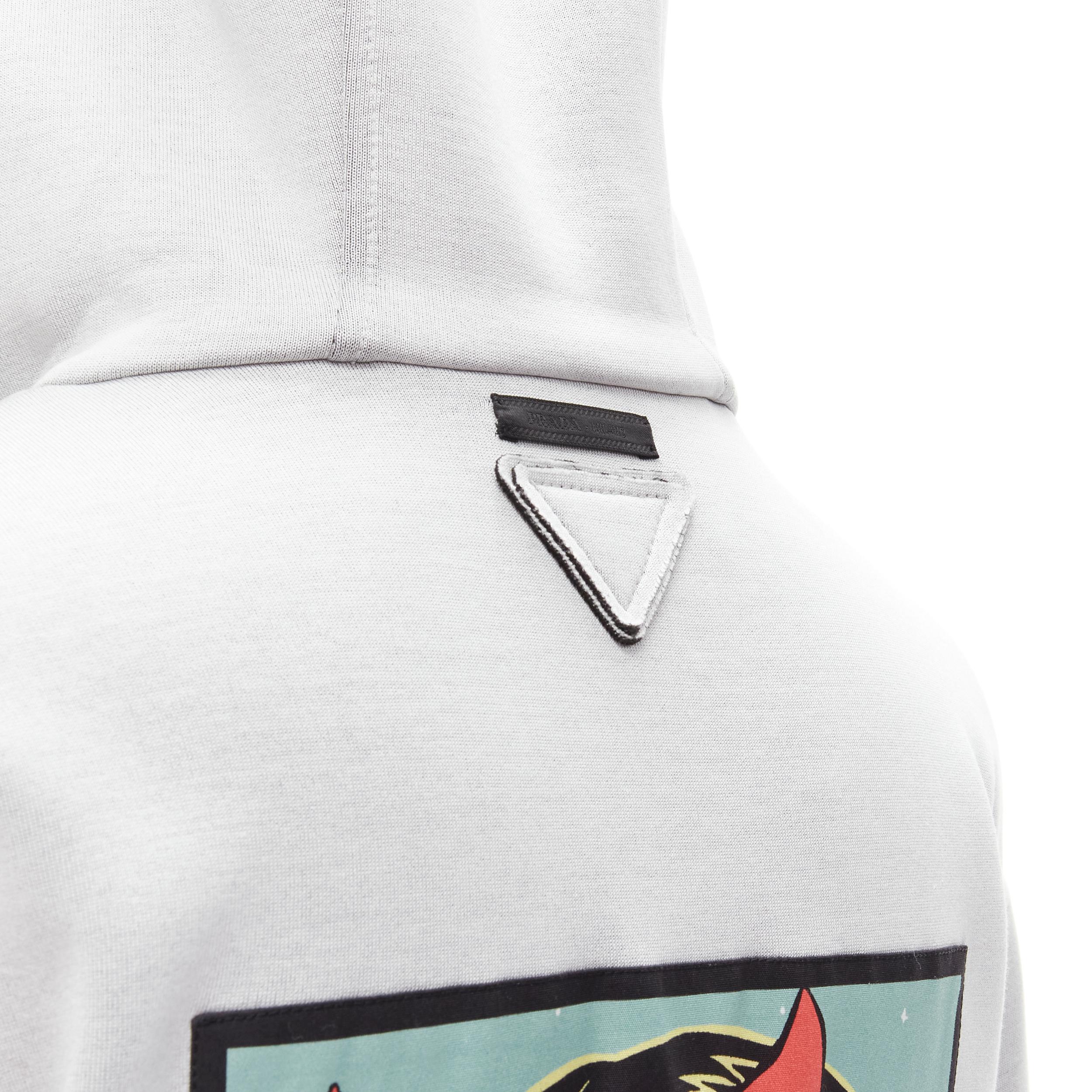 PRADA 2018 Girls Invented comic print grey cotton zip up hoodie S 
Reference: ANWU/A00477 
Brand: Prada 
Designer: Miuccia Prada 
Collection: 2018 Girls Invented 
Material: Cotton 
Color: Grey 
Pattern: Solid 
Closure: Zip 
Extra Detail: Zip front