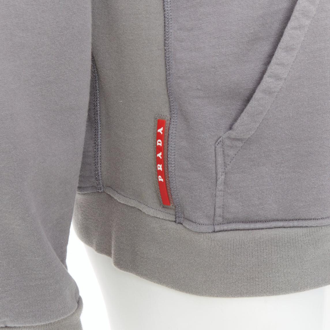 PRADA 2018 Line Rossa grey cotton red sports logo hoodie L
Reference: CNLE/A00417
Brand: Prada
Designer: Miuccia Prada
Collection: 2018
Material: Cotton
Color: Grey, Red
Pattern: Solid
Closure: Slip On
Extra Details: Prada red logo at right