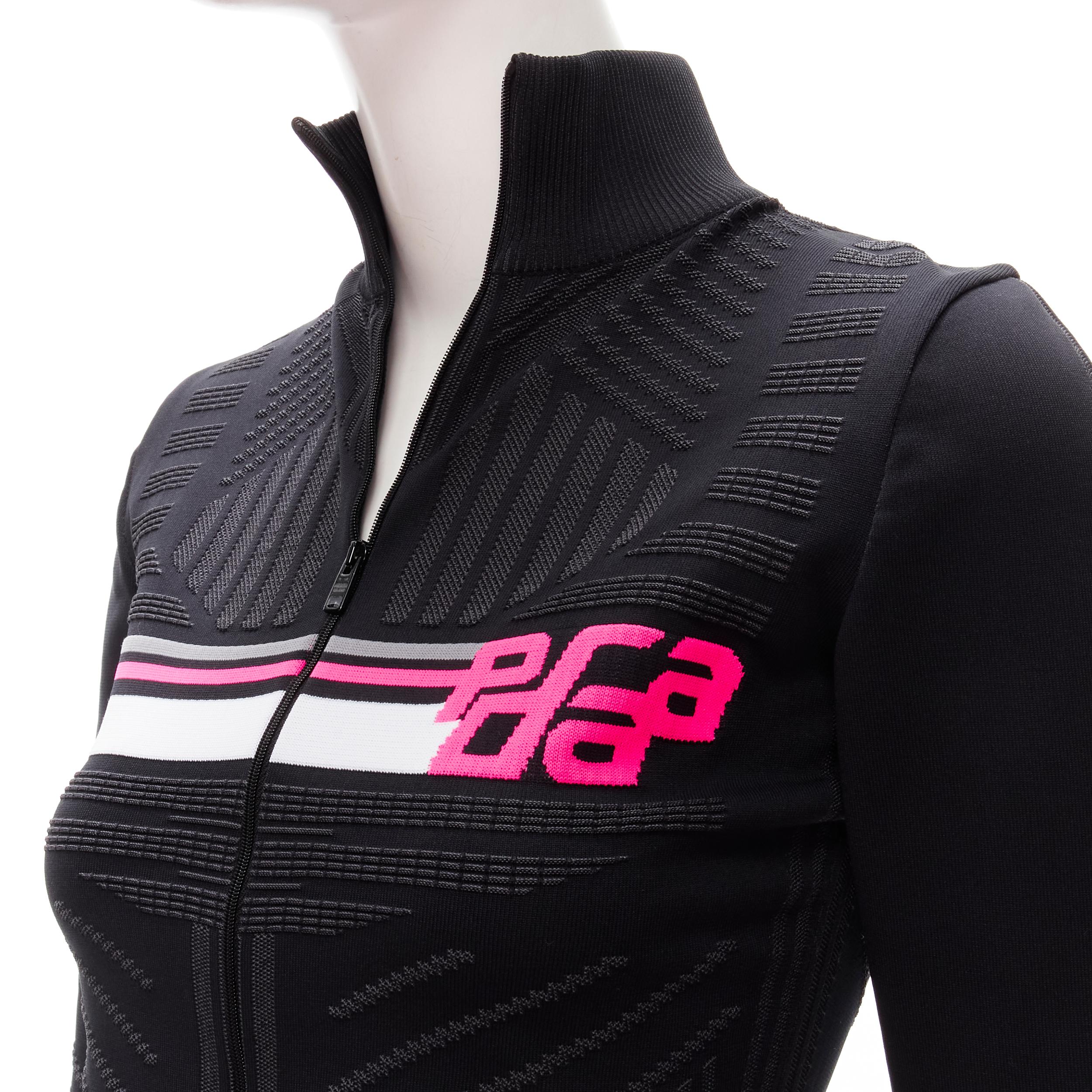 PRADA 2018 pink graphic Racing Sports Logo black bodycon zip up jacket XS
Brand: Prada
Designer: Miuccia Prada
Collection: Fall Winter 2018 
Color: Black
Pattern: Solid
Closure: Zip
Extra Detail: Racing Graphic Prada logo. Intarsia body-con knit.