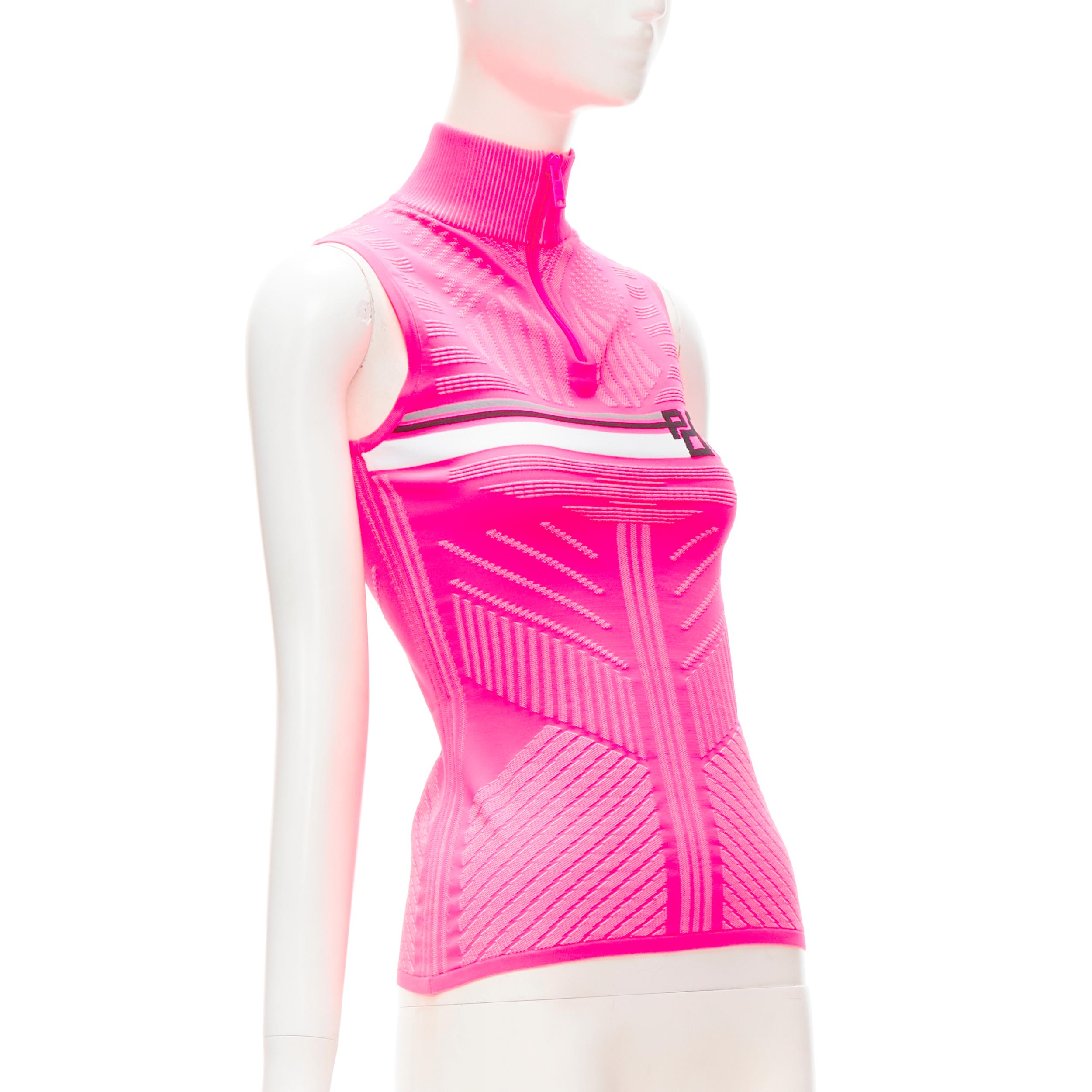 PRADA 2018 pink graphic Racing Sports Logo bodycon zip up top XS
Brand: Prada
Designer: Miuccia Prada
Collection: Fall Winter 2018 
Color: Pink
Pattern: Solid
Closure: Zip
Extra Detail: Half zip collar. Prada logo on zip pull. Intarsia bodycon