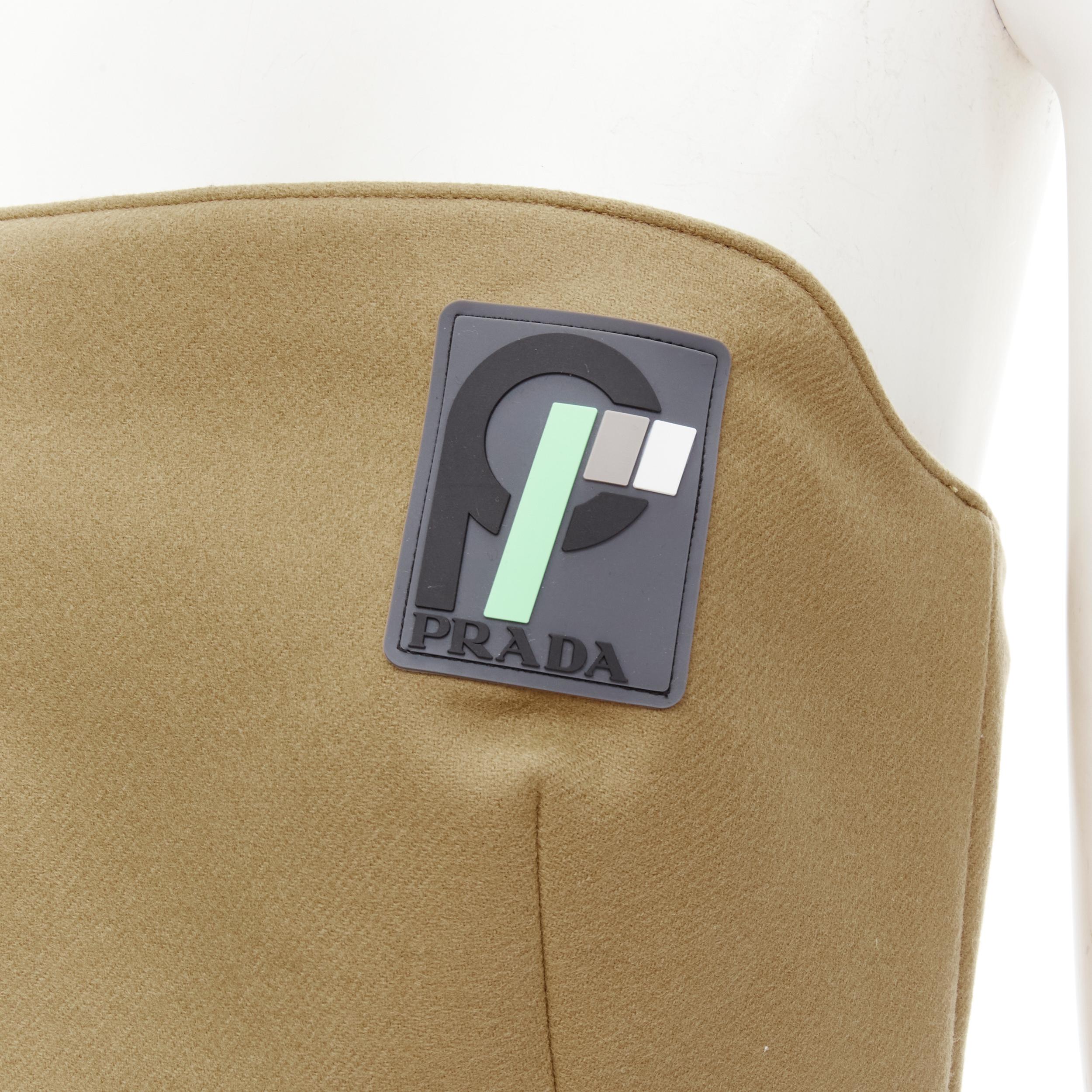 PRADA 2018 Runway brown Sports Logo rubber badge wool strapless bustier S 
Reference: ANWU/A00465 
Brand: Prada 
Designer: Miuccia Prada 
Collection: Fall 2018 
Material: Wool 
Color: Brown 
Pattern: Solid 
Closure: Zip 
Extra Detail: Logo signed