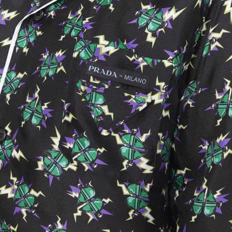 PRADA 2019 Frankenstein Micro Heart black print 100% silk pyjama shirt top M
Reference: TGAS/B00417
Brand: Prada
Designer: Miuccia Prada
Collection: Fall Winter 2019
Material: Silk
Color: Black, Green
Pattern: Abstract
Extra Details: Micro heart