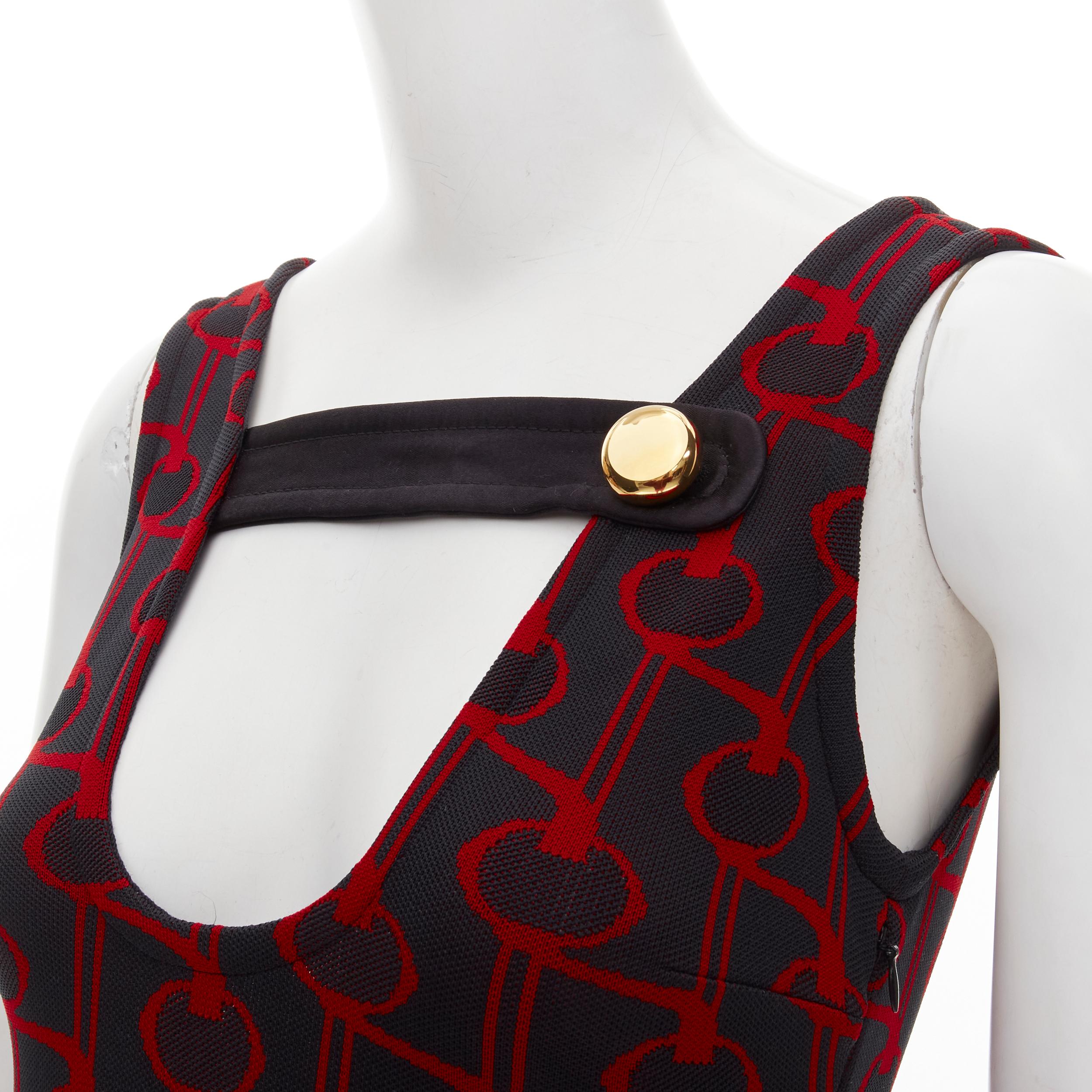 PRADA 2019 Runway black red geometric knit button strap bodysuit top S 
Reference: ANWU/A00777 
Brand: Prada 
Designer: Miuccia Prada 
Collection: Spring Summer 2019 Runway 
Color: Red 
Pattern: Geometric 
Closure: Button 
Extra Detail: Black silk