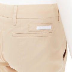 PRADA 2020: pantalones cortos de mezcla de algodón claro en color beige con el logotipo en blanco en la costura, talla IT40 S