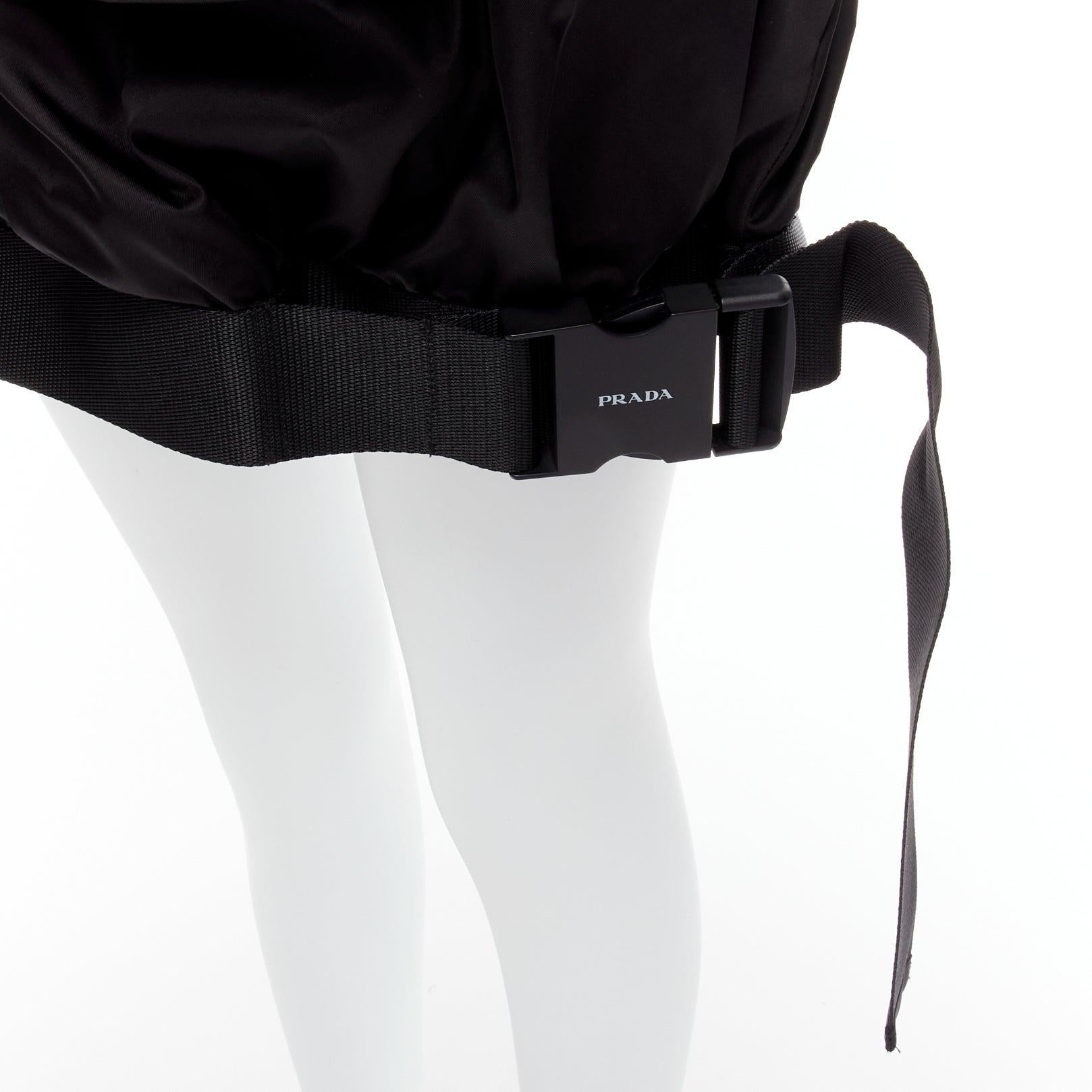 PRADA 2020 Re Nylon black triangle logo front pocket buckle bubble skirt IT38 XS
Reference: TGAS/D00486
Brand: Prada
Designer: Miuccia Prada
Collection: 2020
Material: Nylon
Color: Black
Pattern: Solid
Closure: Zip
Lining: Black Nylon
Extra Details: