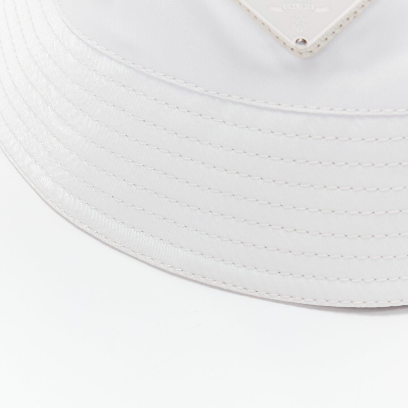 PRADA 2020 Re Nylon Symbole white enamel triangle logo bucket hat M In Excellent Condition For Sale In Hong Kong, NT