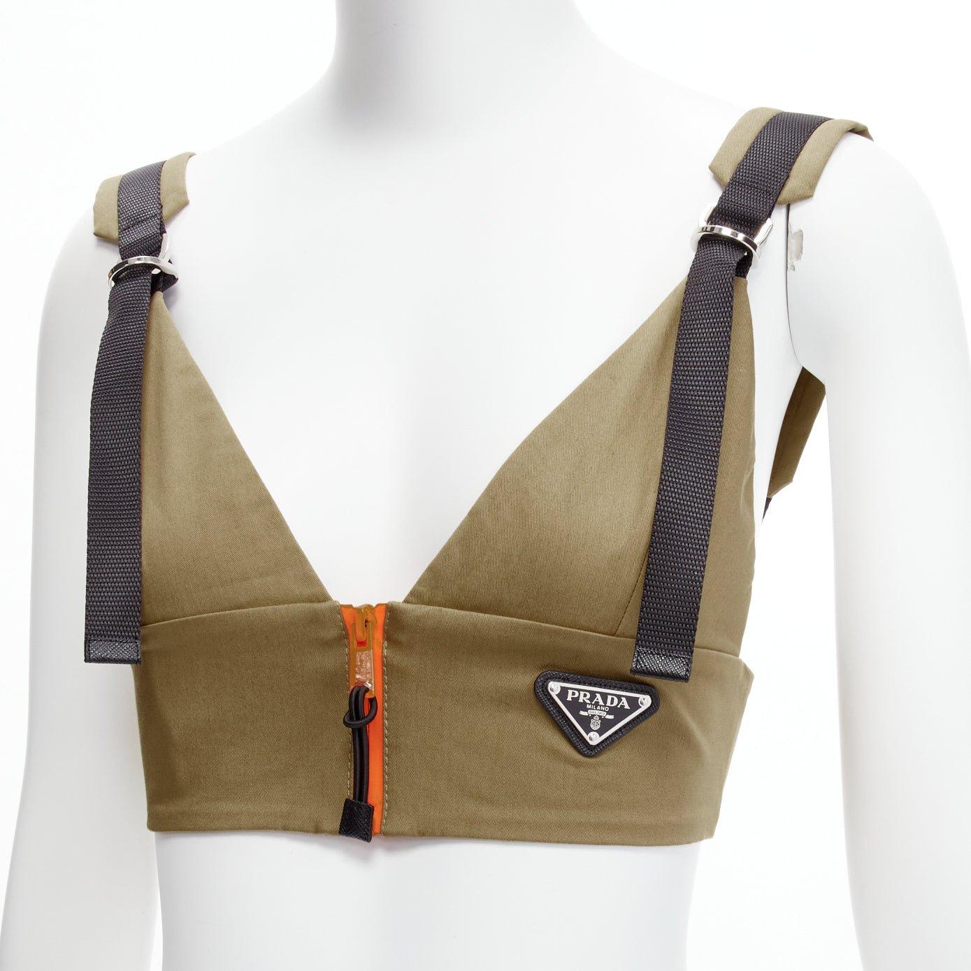 PRADA 2021 orange zip khaki green technical strap bra top IT40 S
Reference: TGAS/D00483
Brand: Prada
Designer: Miuccia Prada
Collection: 2021
Material: Cotton, Elastane
Color: Green, Black
Pattern: Solid
Closure: Zip
Lining: Beige Fabric
Extra