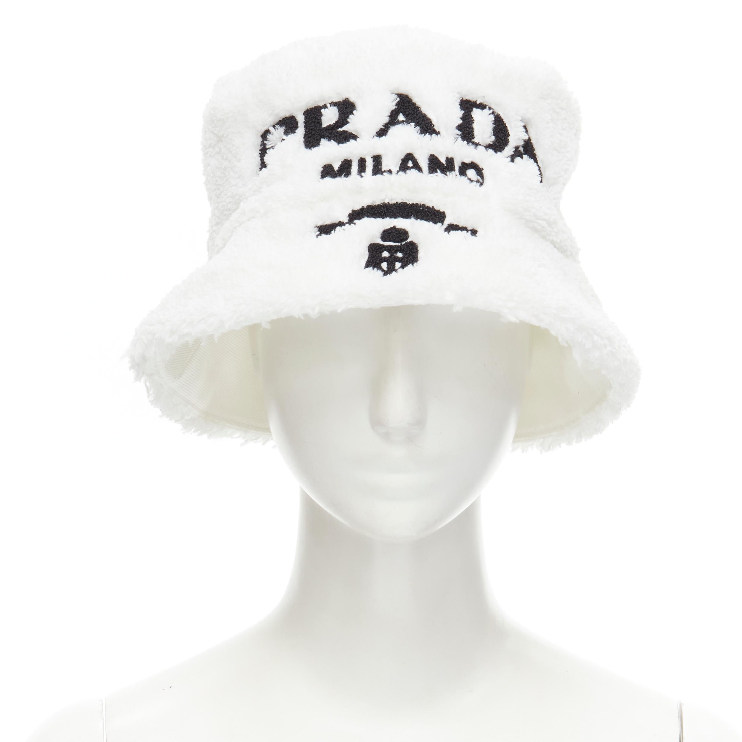 PRADA 2021 soft terry cotton logo embroidery iconic bucket hat S 
Reference: TGAS/B02234 
Brand: Prada 
Designer: Miuccia Prada 
Material: Cotton 
Color: White 
Pattern: Solid 
Extra Detail: White terrycloth cotton. Black logo embroidery. Classic