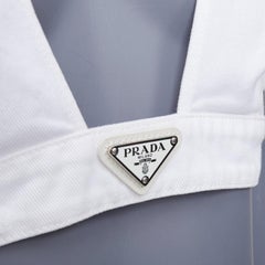 PRADA 2022 white distressed denim triangle logo plunge bralette crop top IT42 M