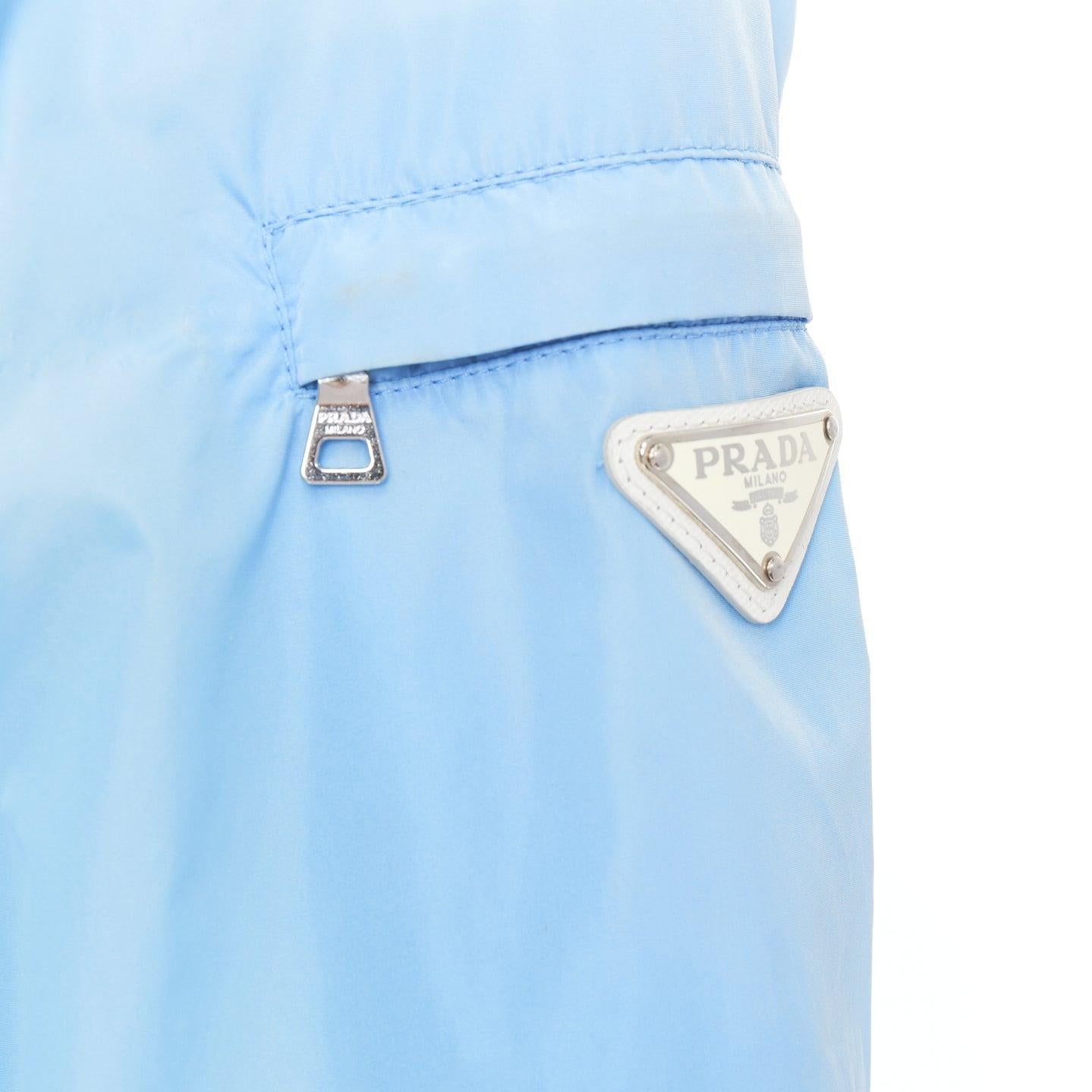 PRADA 29H135 sky blue nylon white logo arm cropped jacket IT40 S
Reference: GEGG/A00174
Brand: Prada
Designer: Miuccia Prada
Model: 29H135
Material: Nylon
Color: Blue, White
Pattern: Solid
Closure: Zip
Lining: Blue Fabric
Extra Details: White logo
