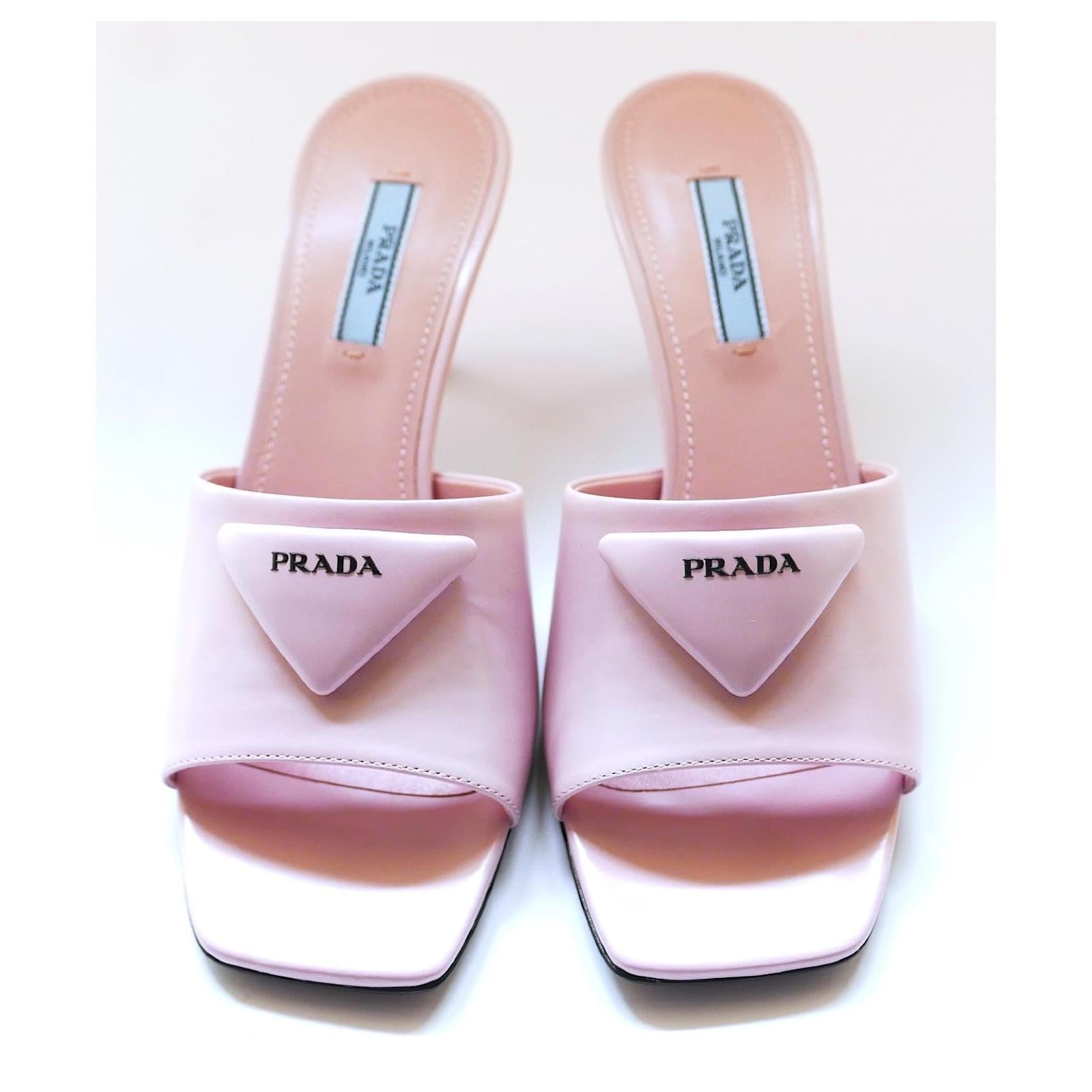 Barbie-esque Prada 75 Triangle Logo mules. Current collection - bought for £830 and new with box, dustbags and care leaflet in envelope. Made from Alabastro pink leather, they have a sleek 90s inspired shape with triangle logo badge and 75mm kitten